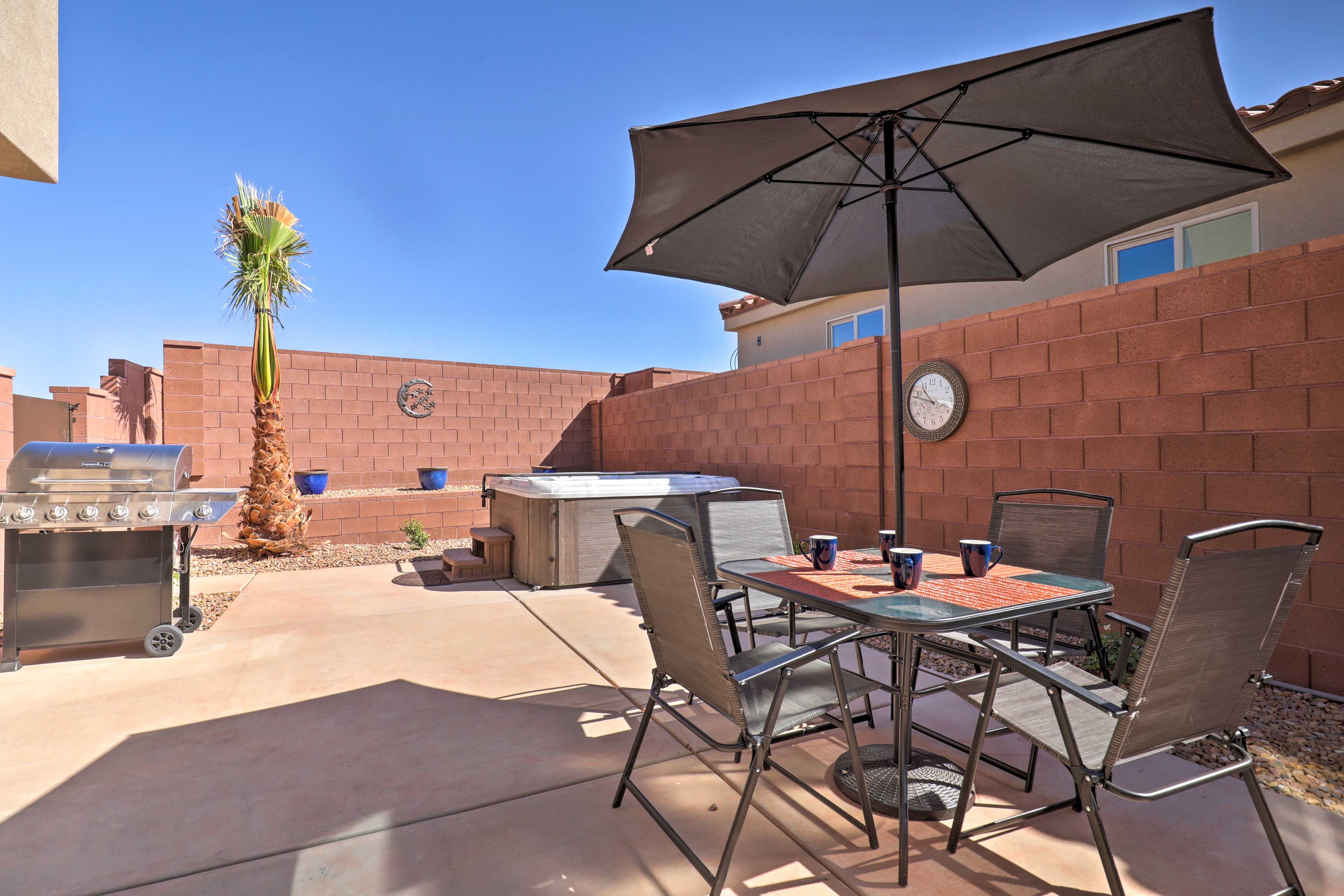 Go for a dip in the hot tub while dinner sizzles away on the gas grill!