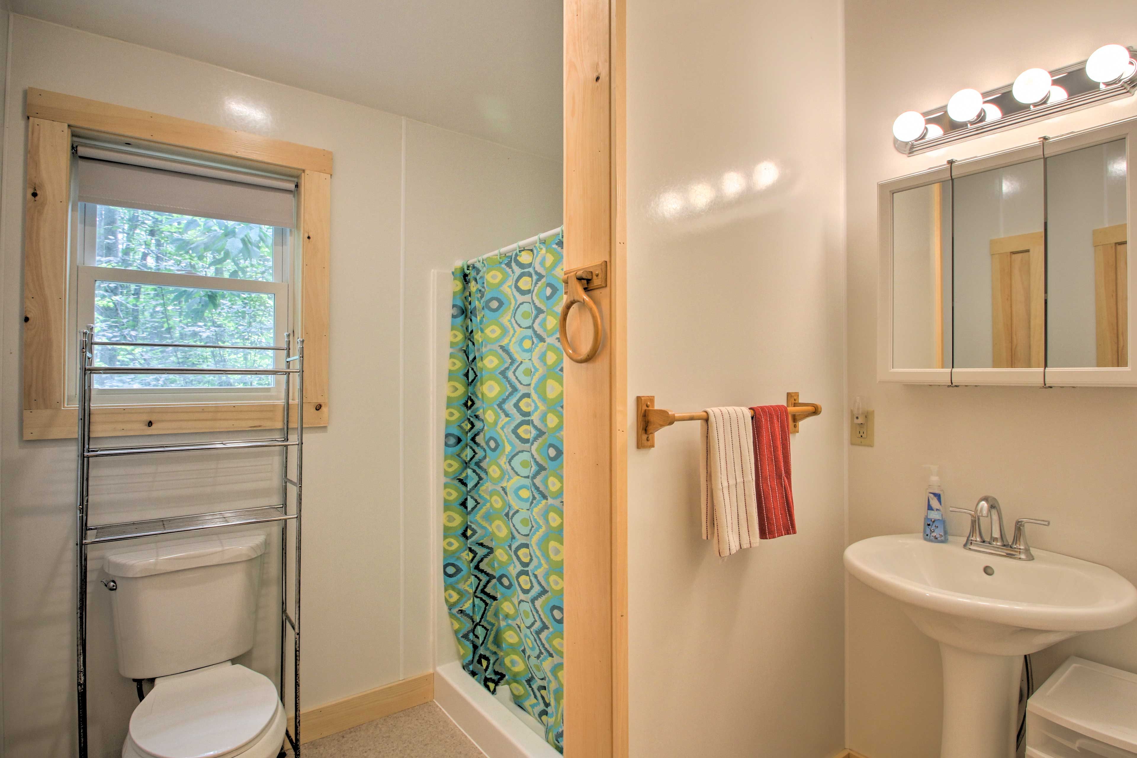 The cabin boasts a bright bathroom.
