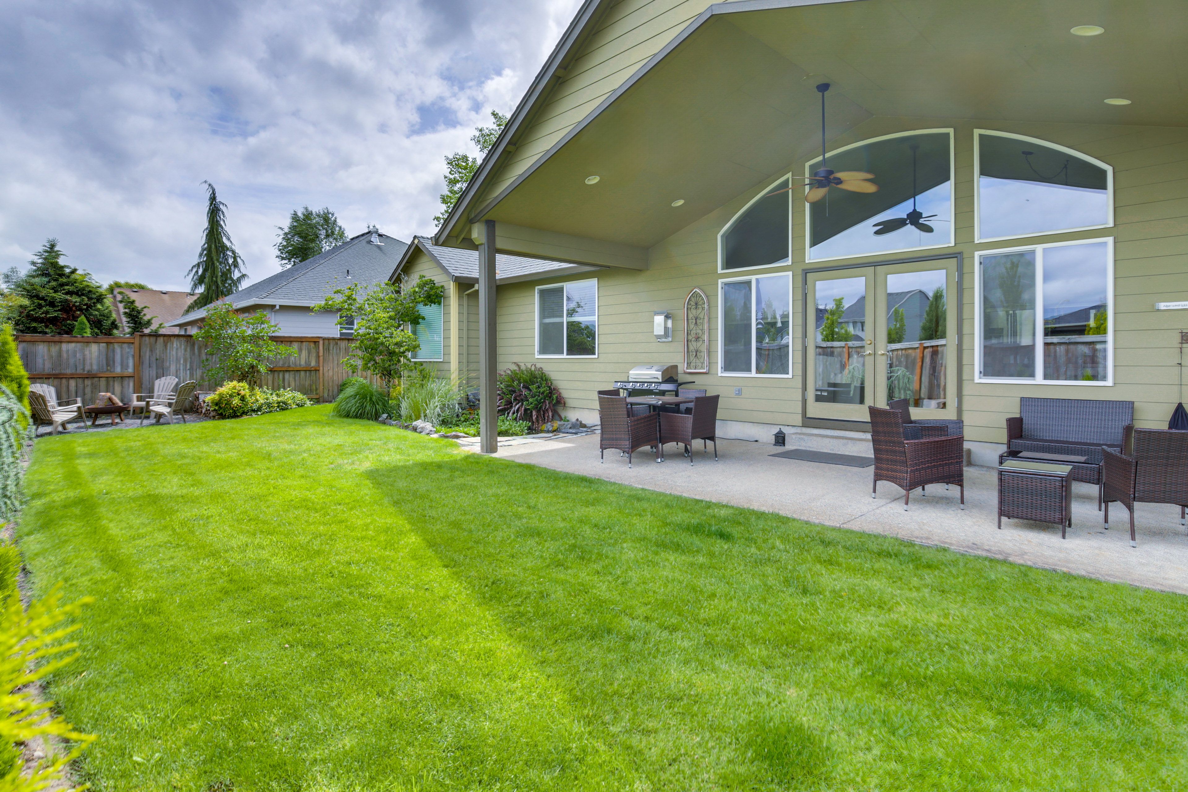Backyard | Patio | Outdoor Dining Area | Gas Grill | Koi Pond | Cornhole