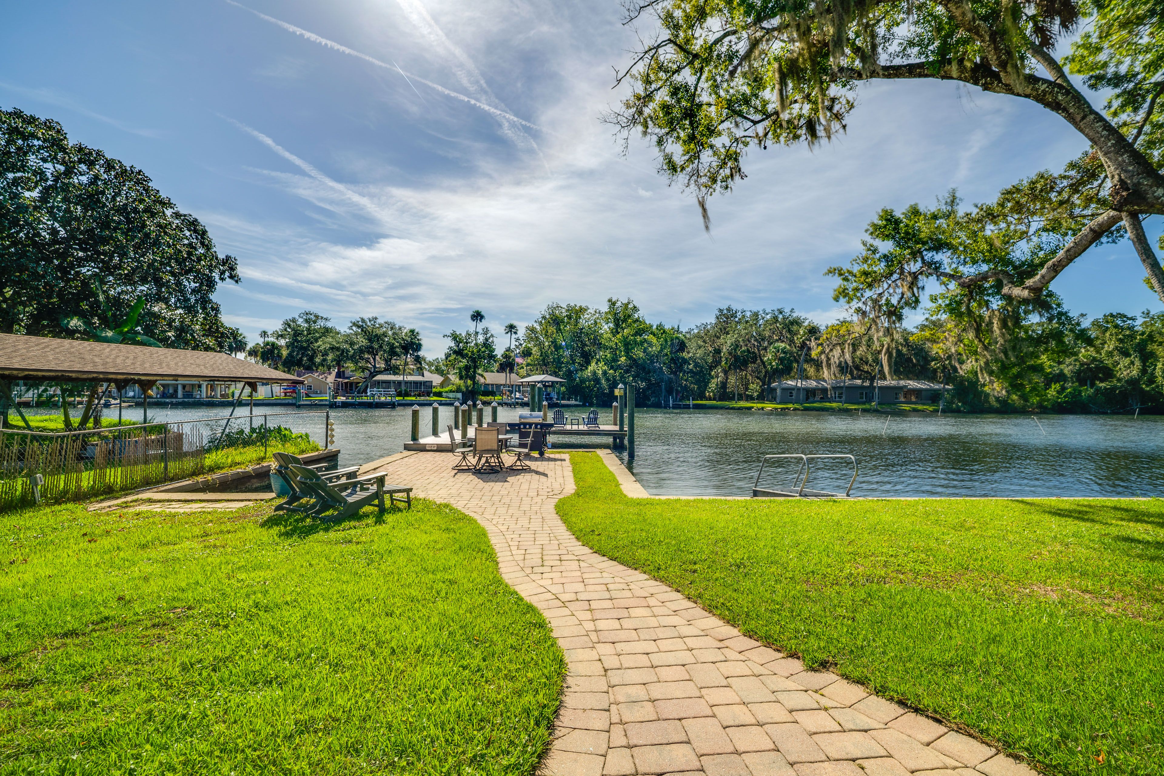 Waterfront Patio | Gas Grill | Dining Area