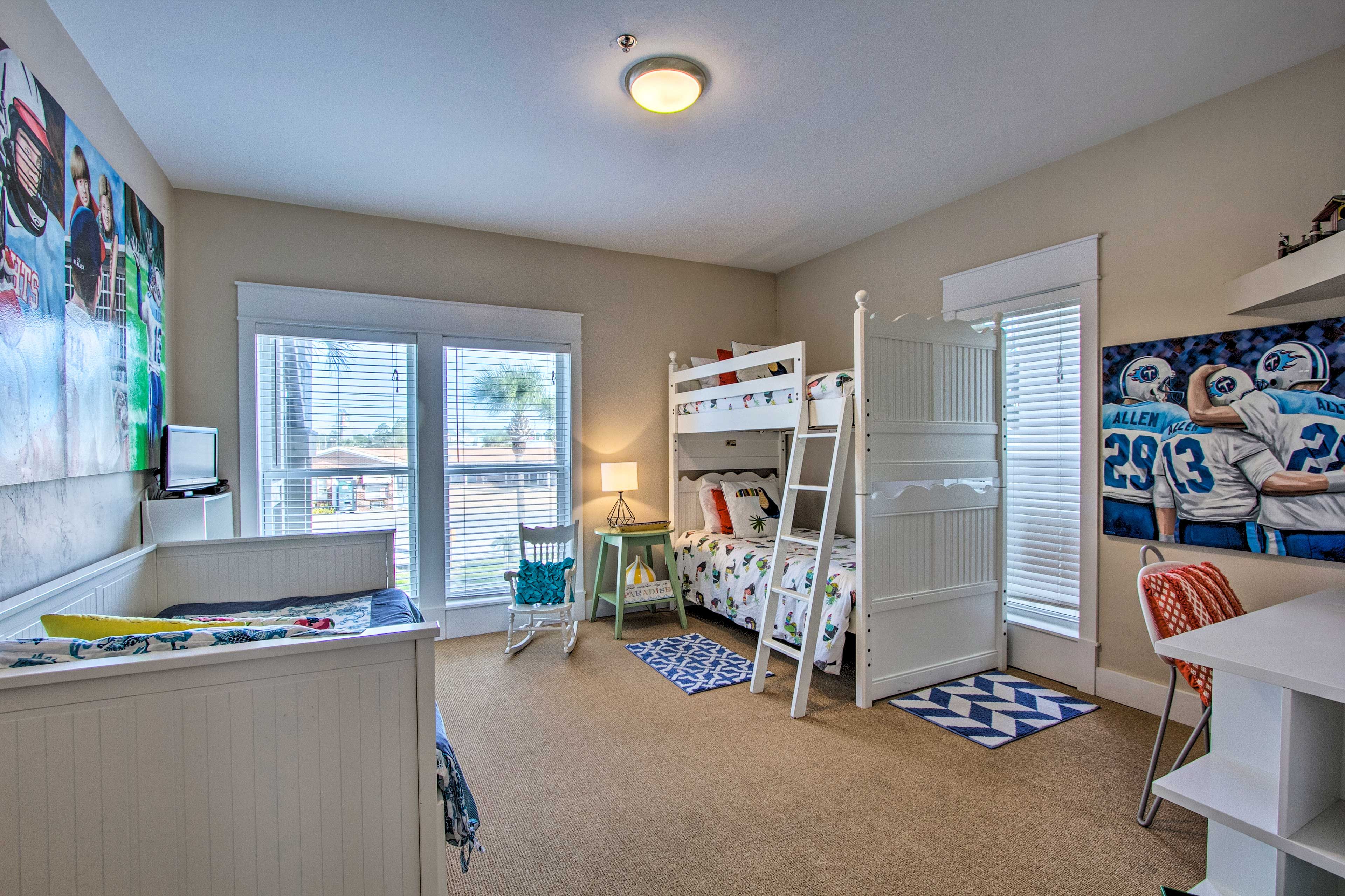 This room has a twin bunk bed and a daybed with a king trundle.