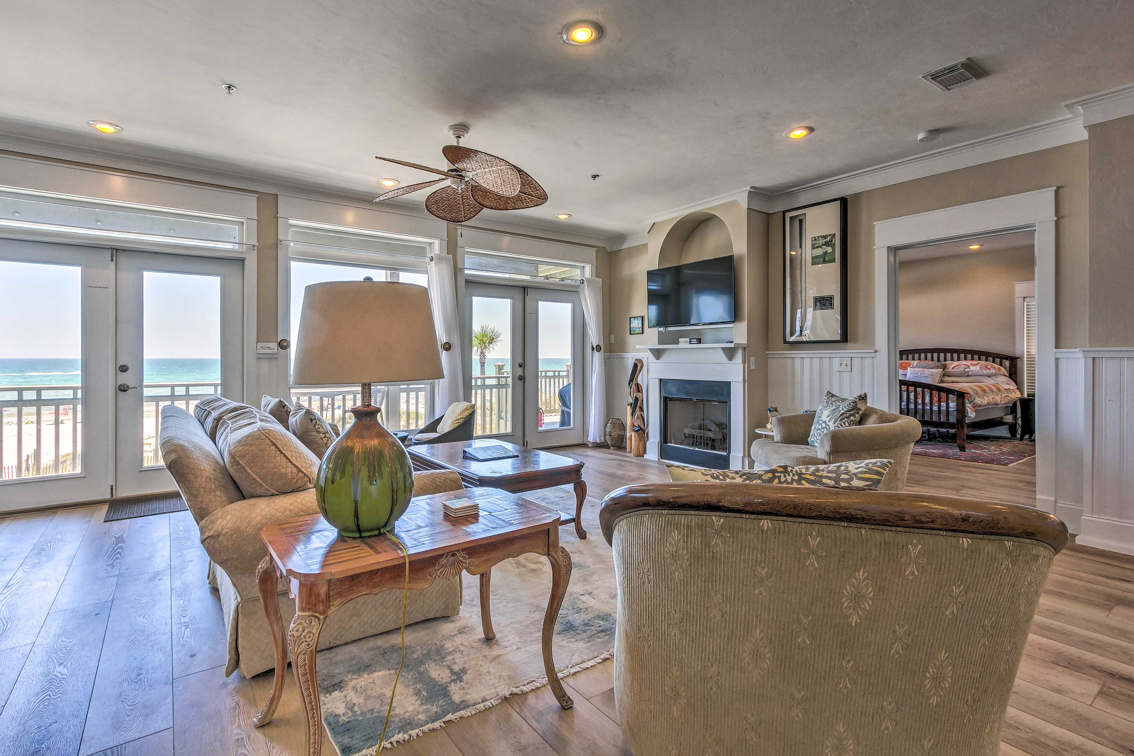 The bright and airy living room is the perfect place to unwind.