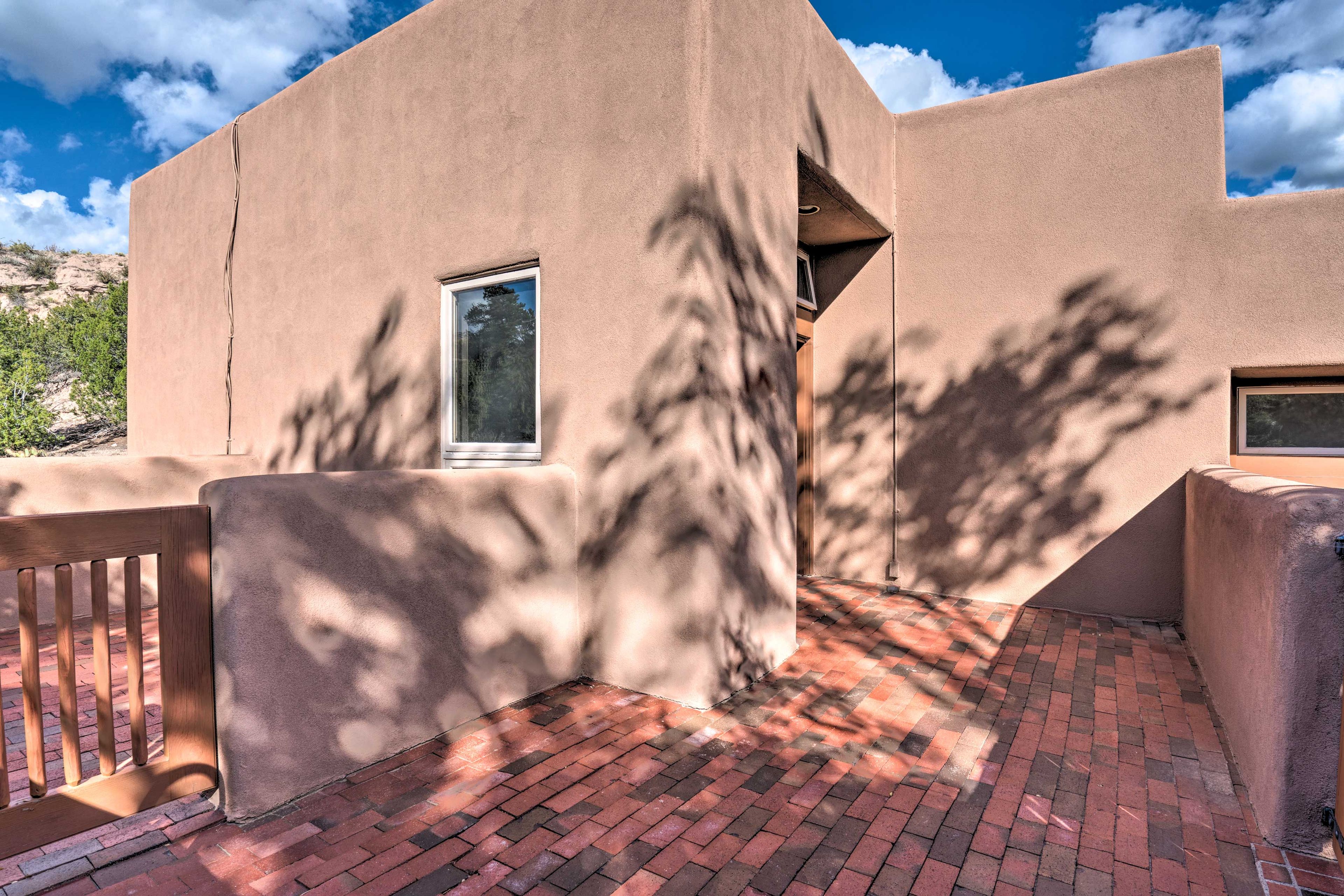 The Pueblo Encantado condo complex boasts a charming adobe exterior.