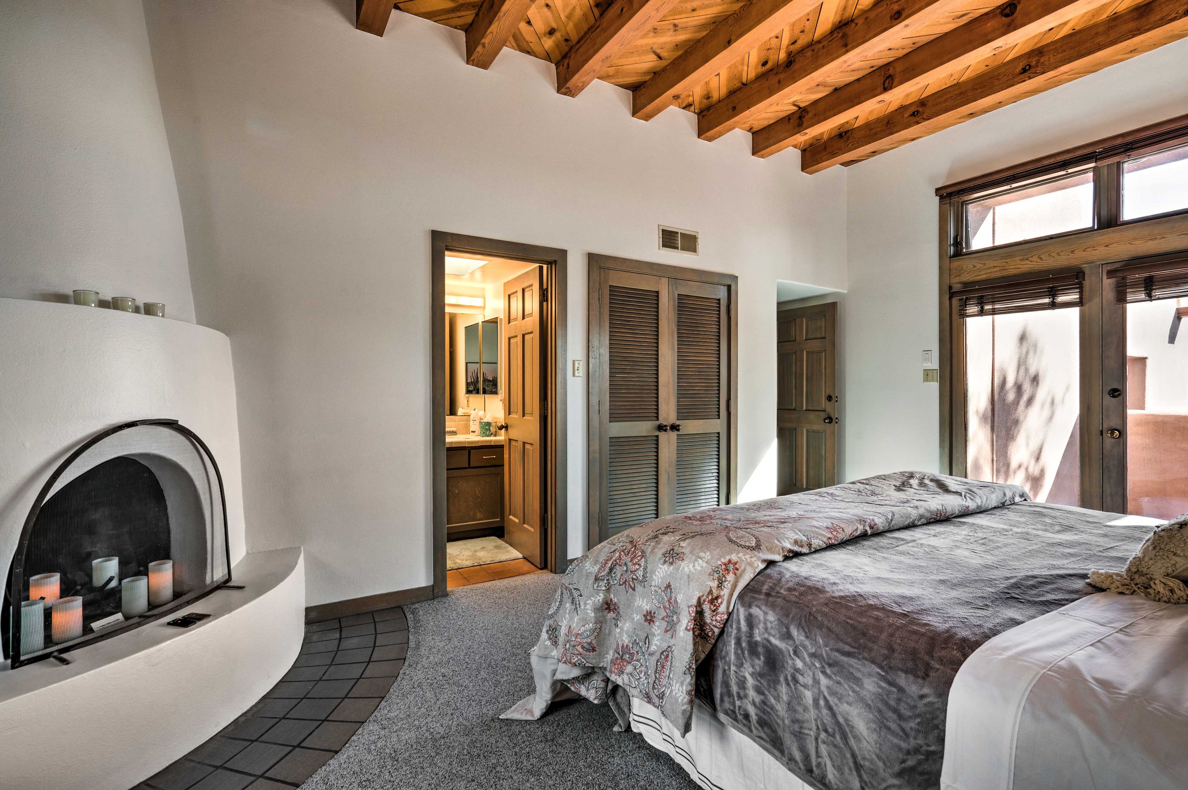 The decorative fireplace adds extra charm to this well-appointed abode.