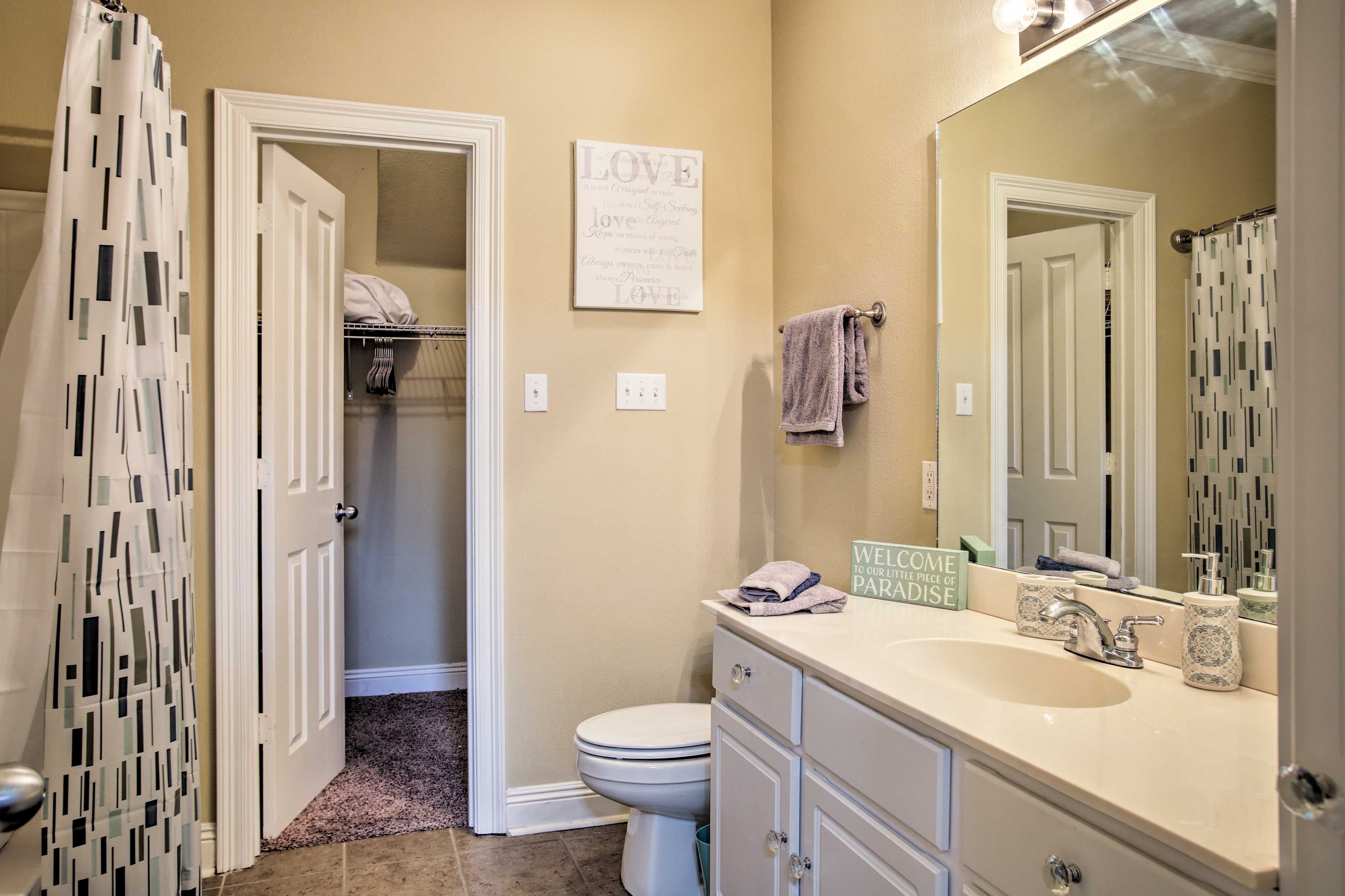 The room has a large walk-in closet.