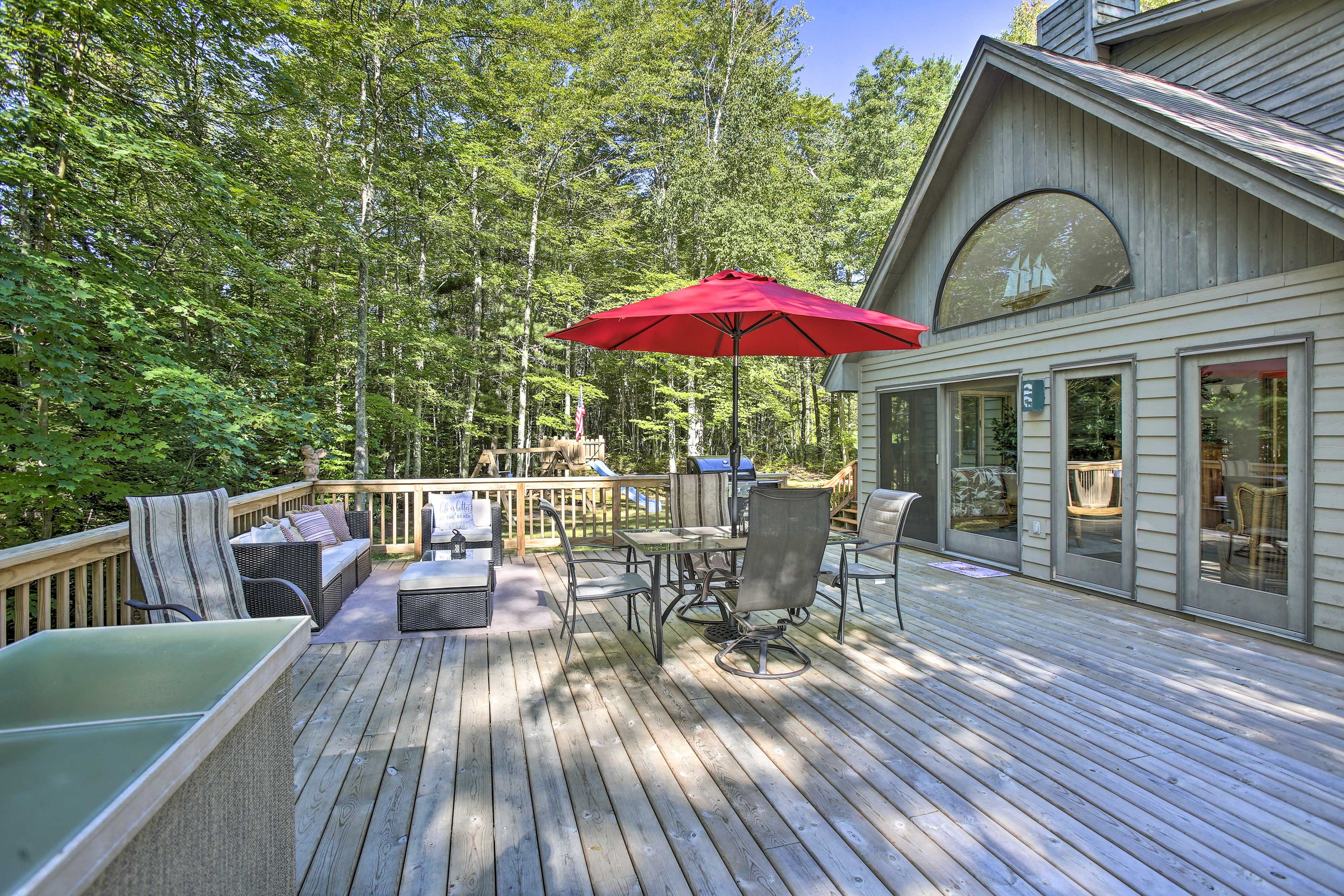 Dine al fresco around the outdoor dining table.