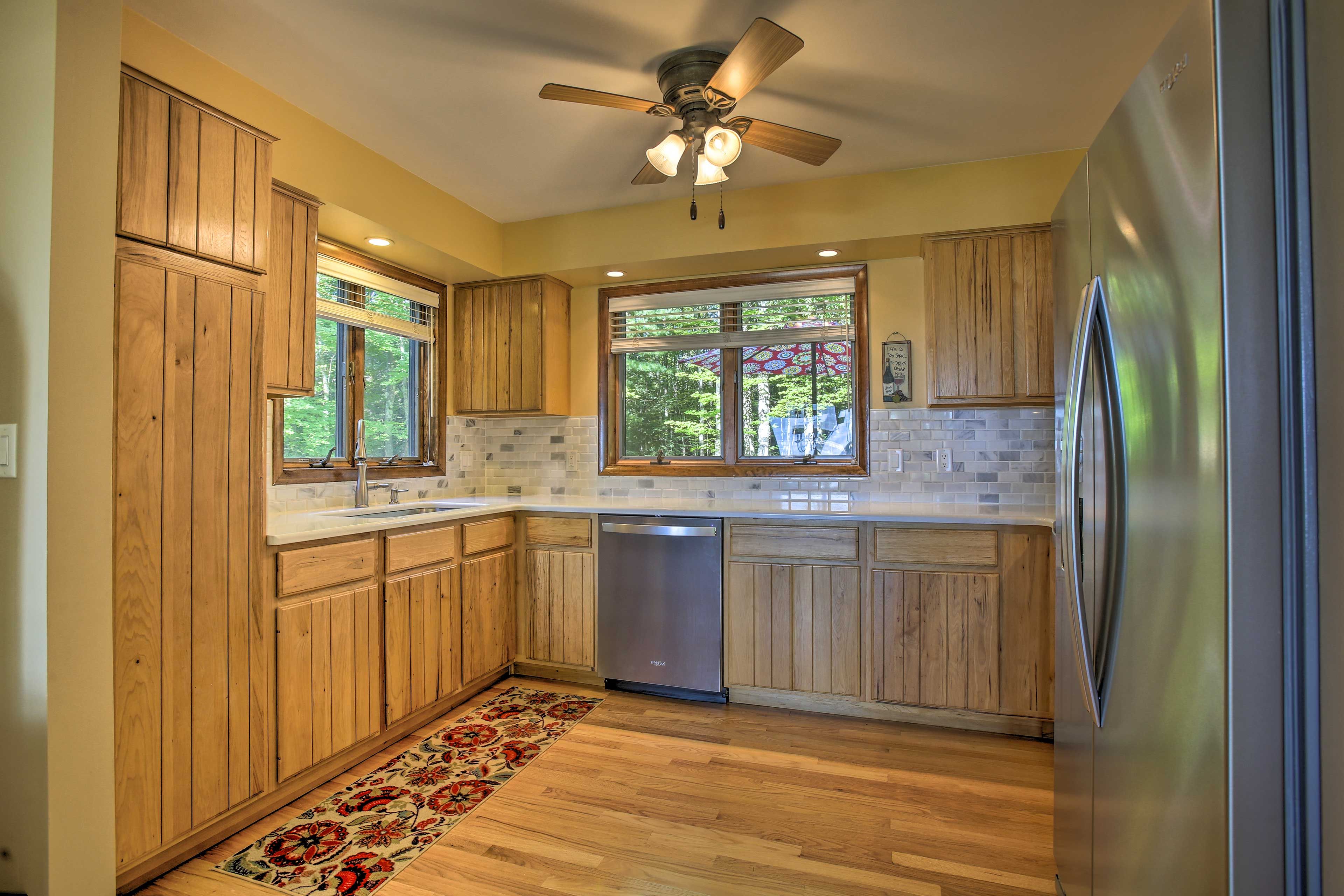 The newly renovated kitchen features stainless steel appliances.