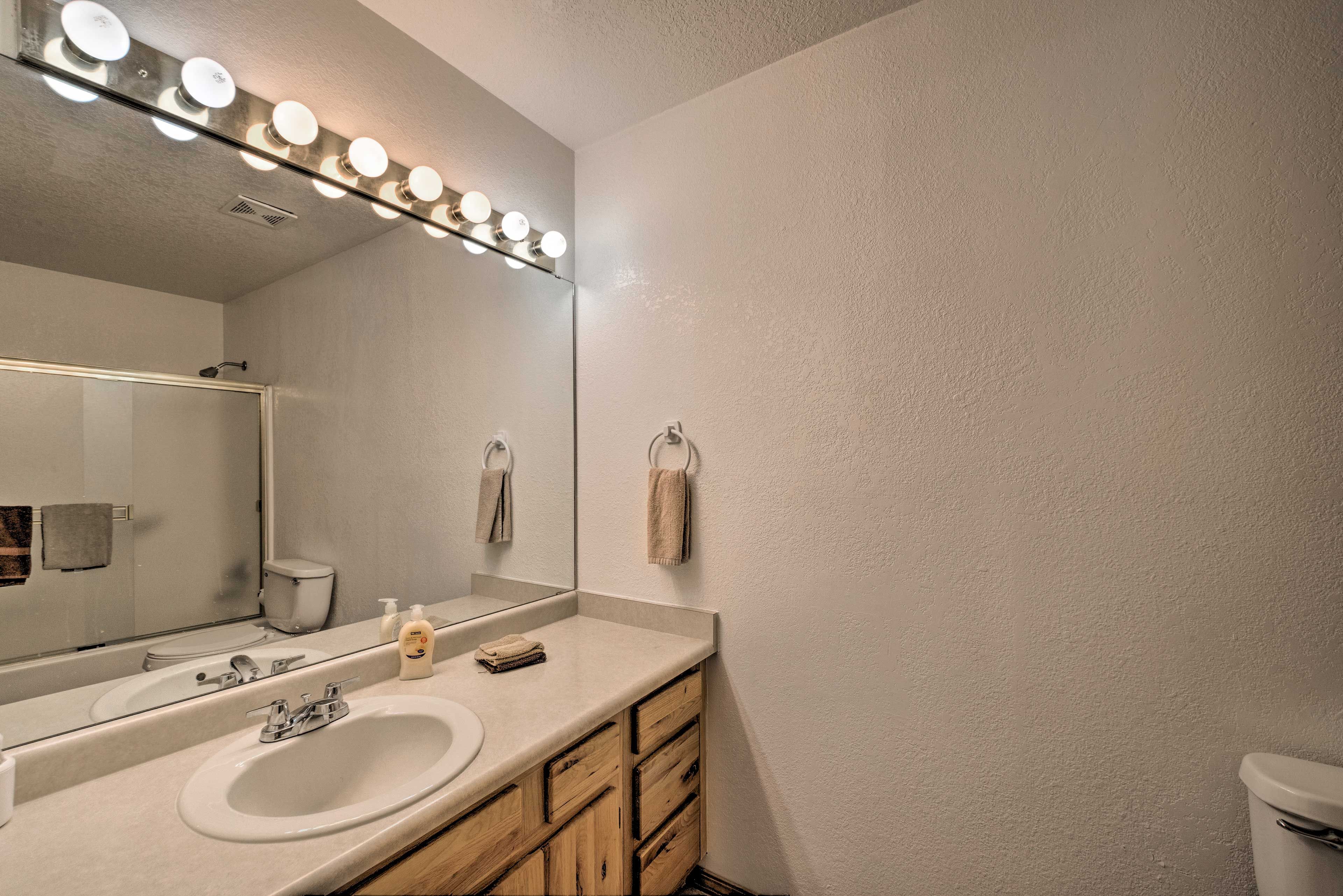 Store your toiletries under the sink.