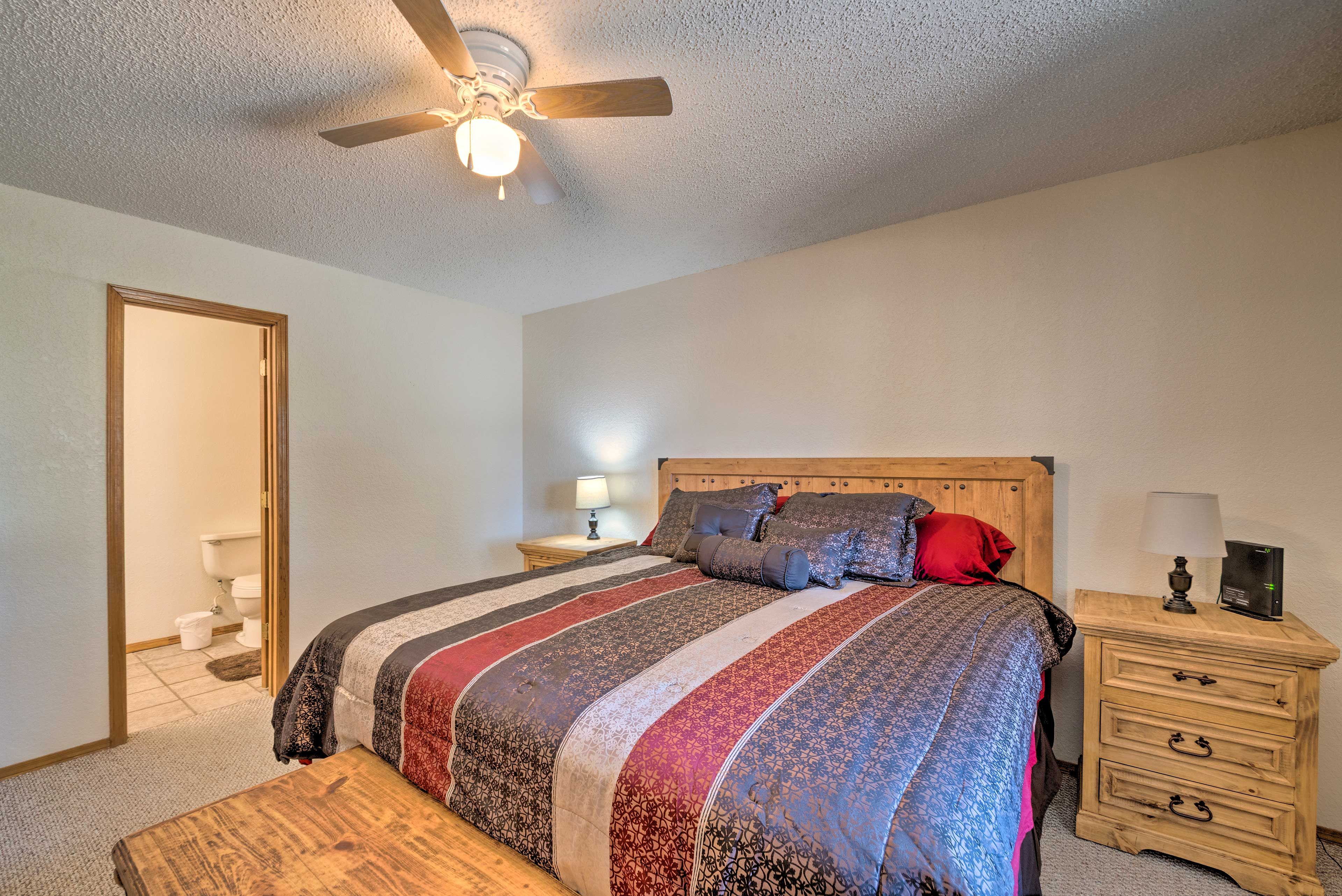 An en-suite bathroom completes the bedroom.