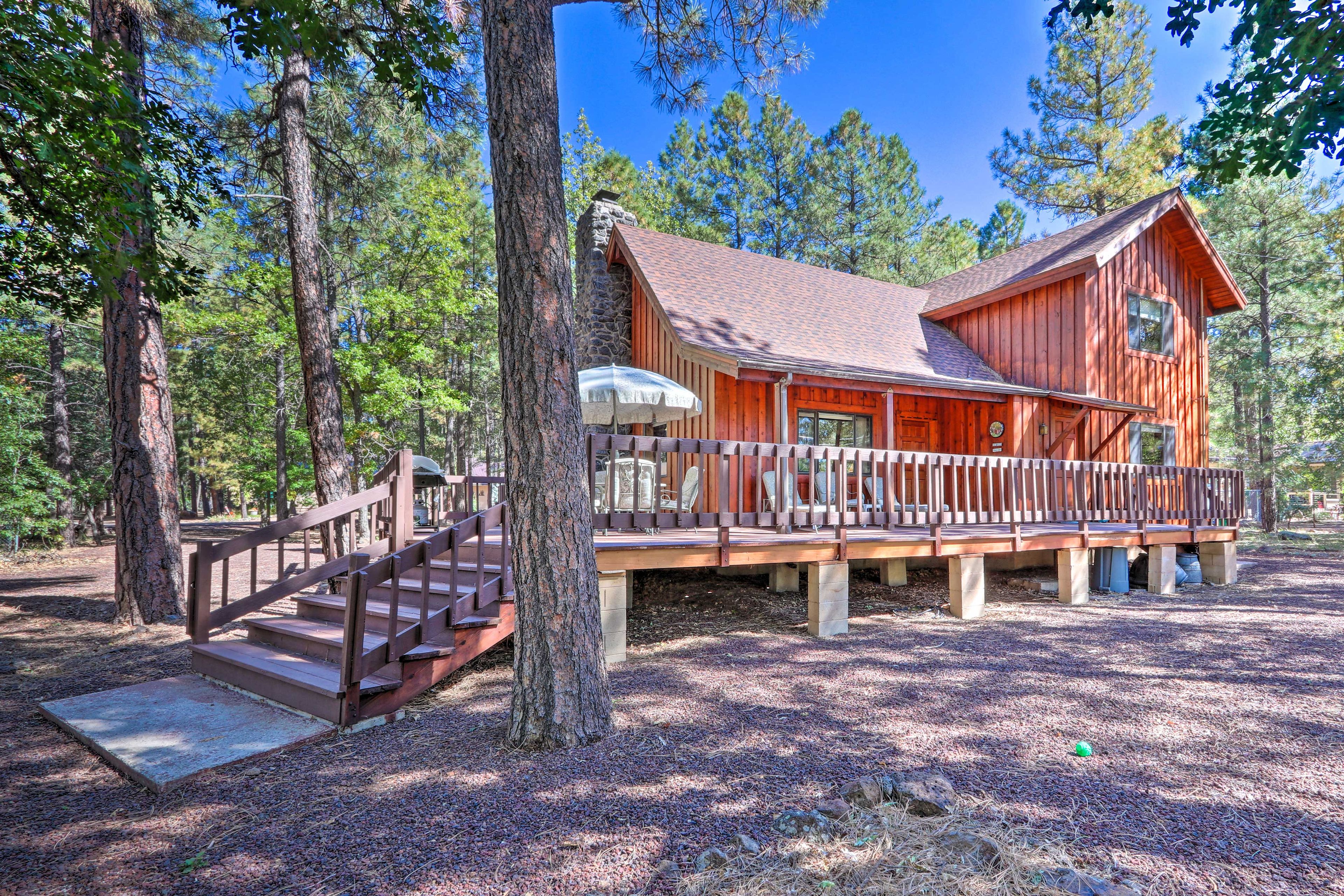 The cabin boasts a spacious wraparound deck.