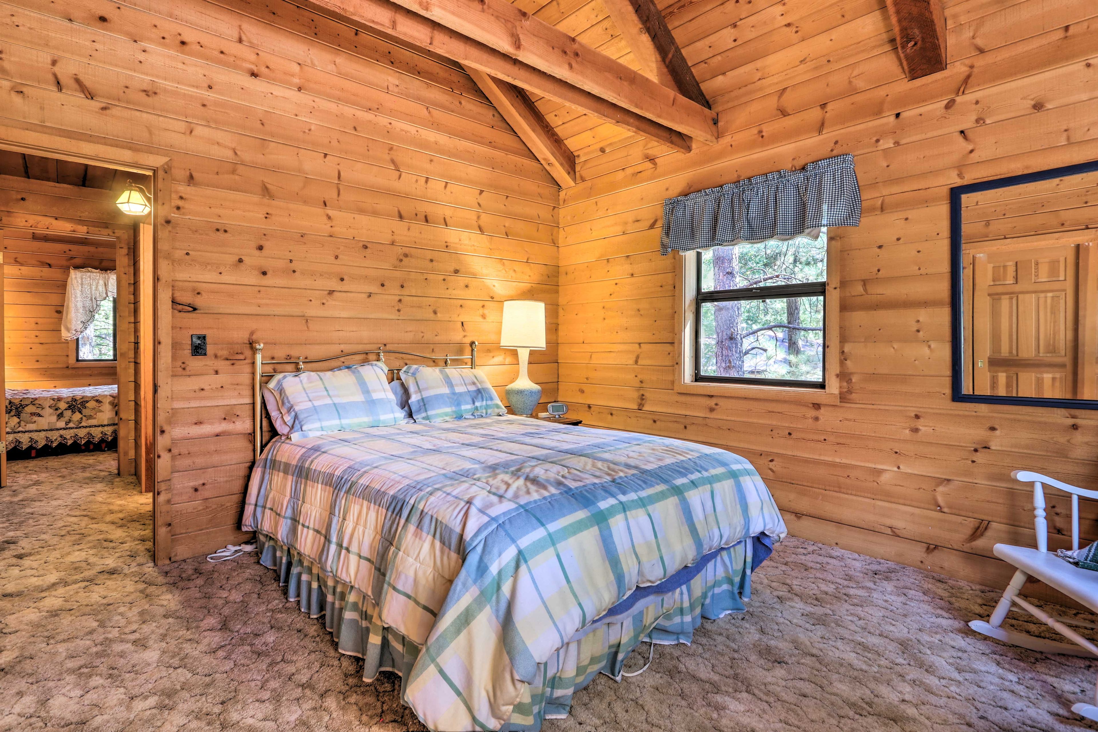 The second bedroom features a full-sized bed.