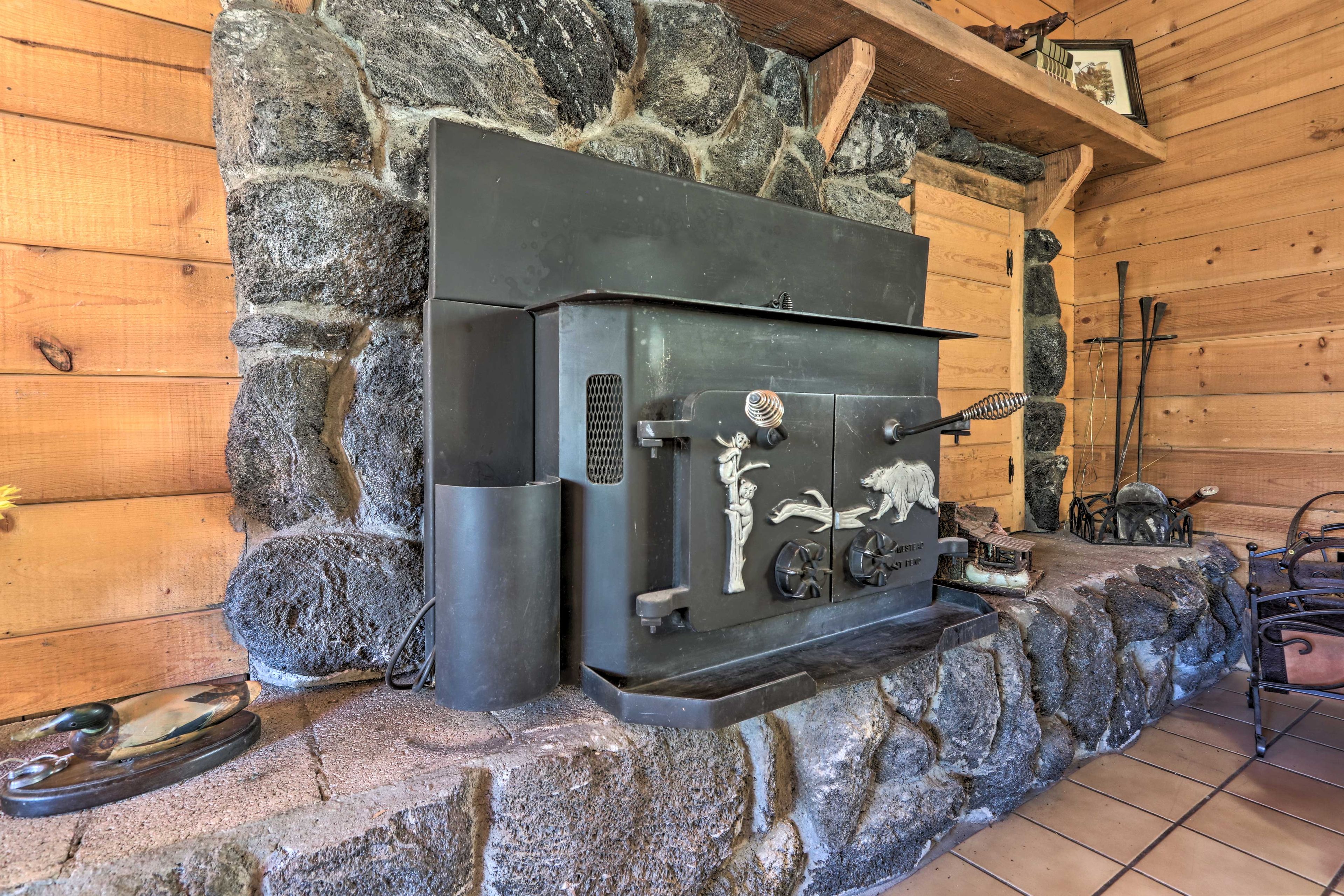 On chilly nights, be sure to warm up by the fireplace.