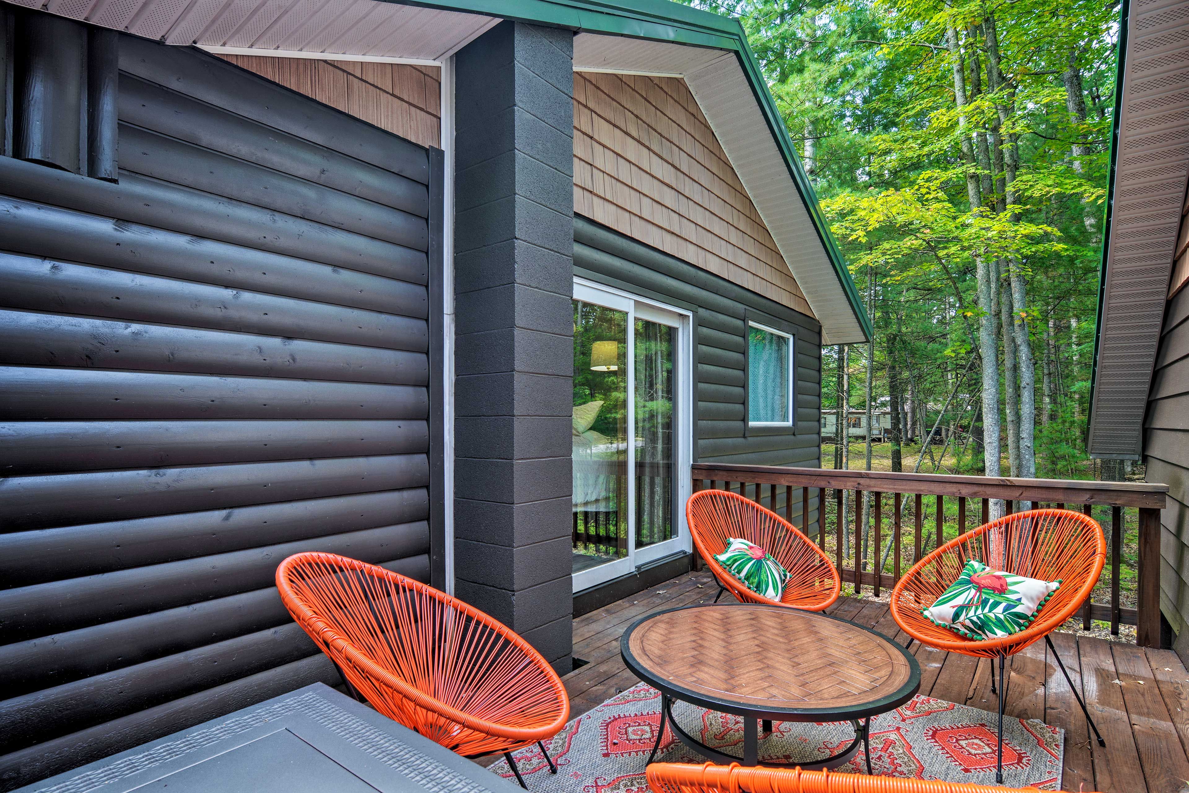 After a day on the lake or trails, unwind on the deck with a glass of wine.