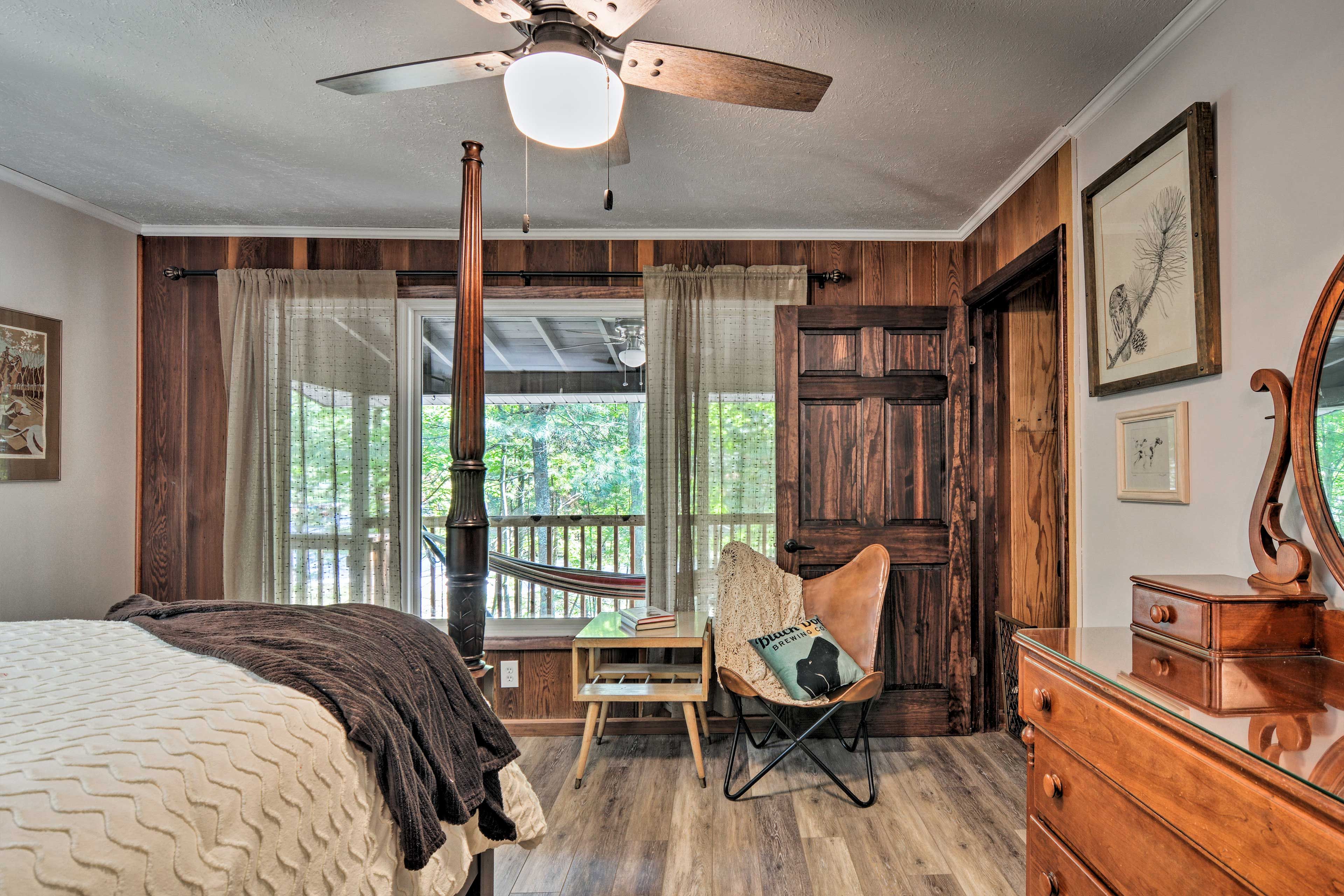 Wake to forest views from the comfort of the queen bed for 2.