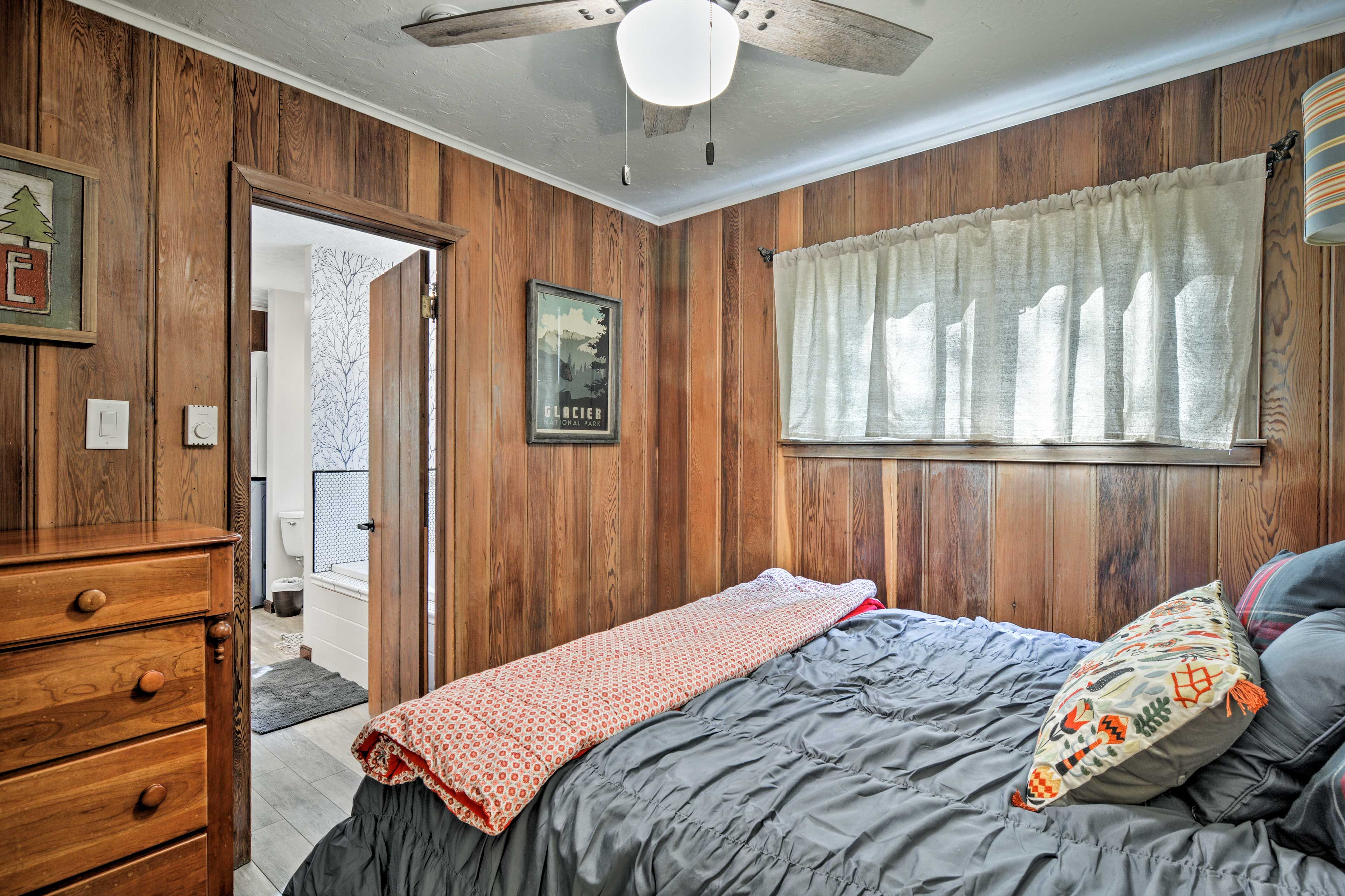 Easily access the full bathroom from this room.