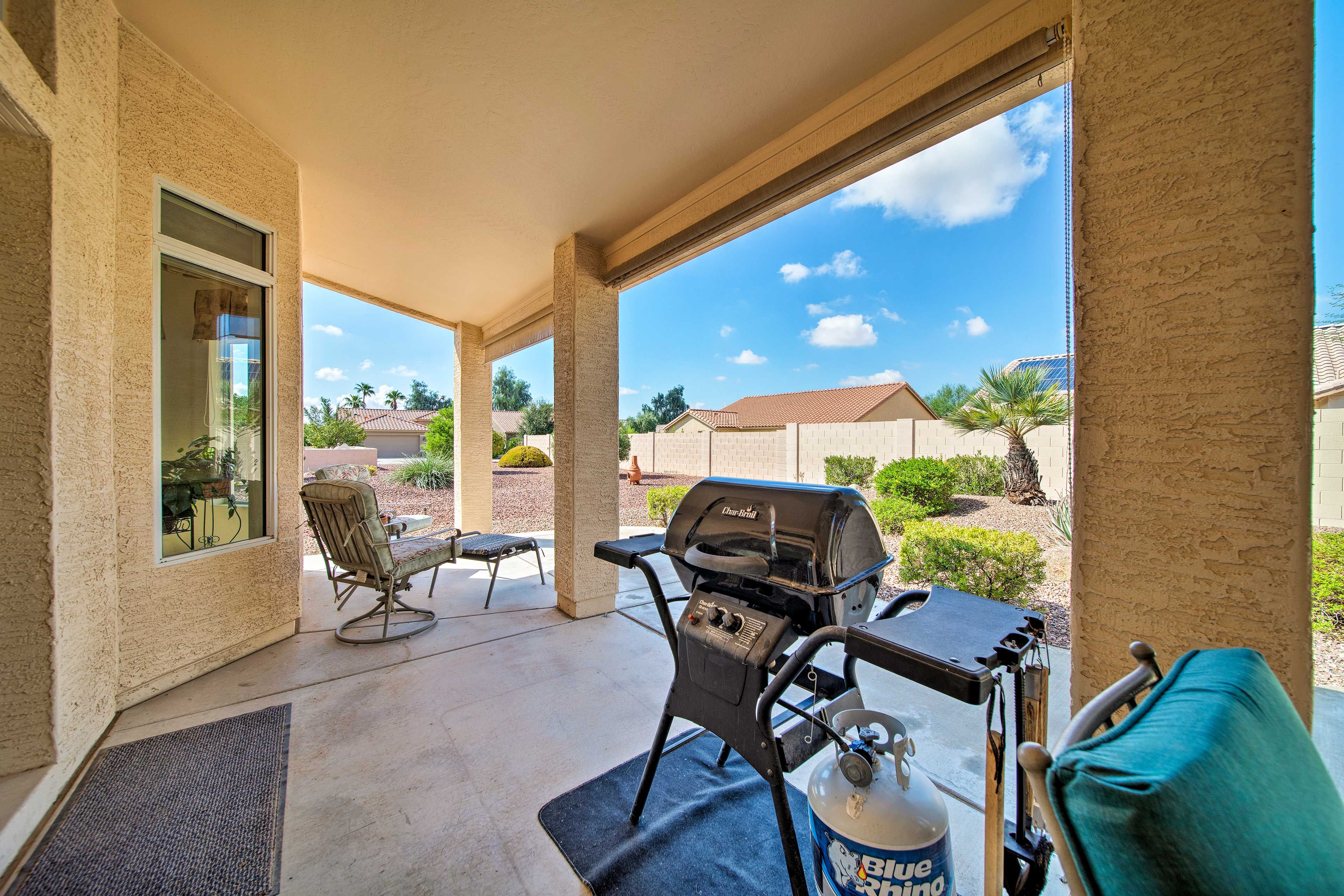 Access the patio through the living room's sliding glass doors.