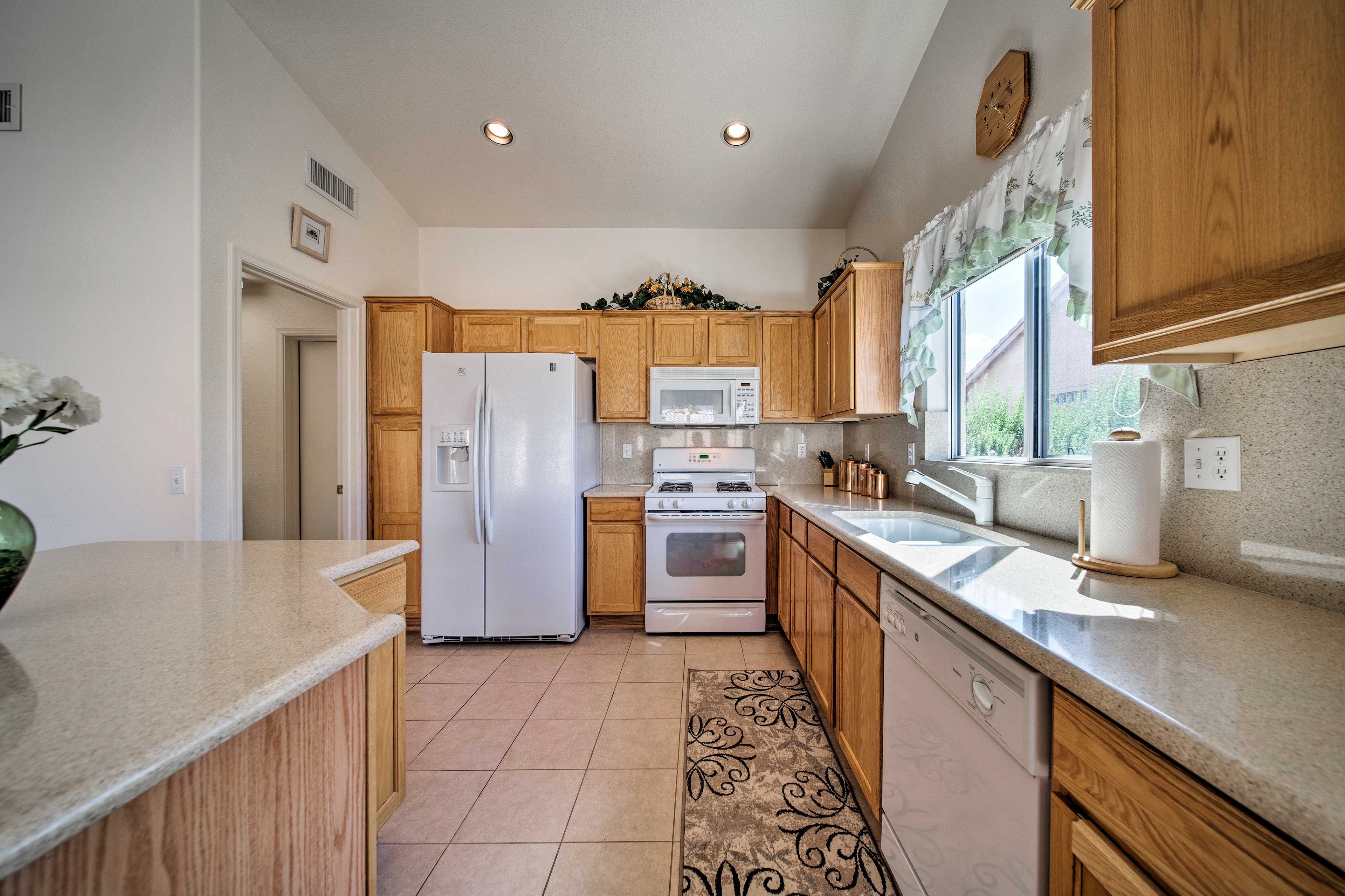 Hungry? Head to the fully equipped kitchen to whip up a hearty meal.