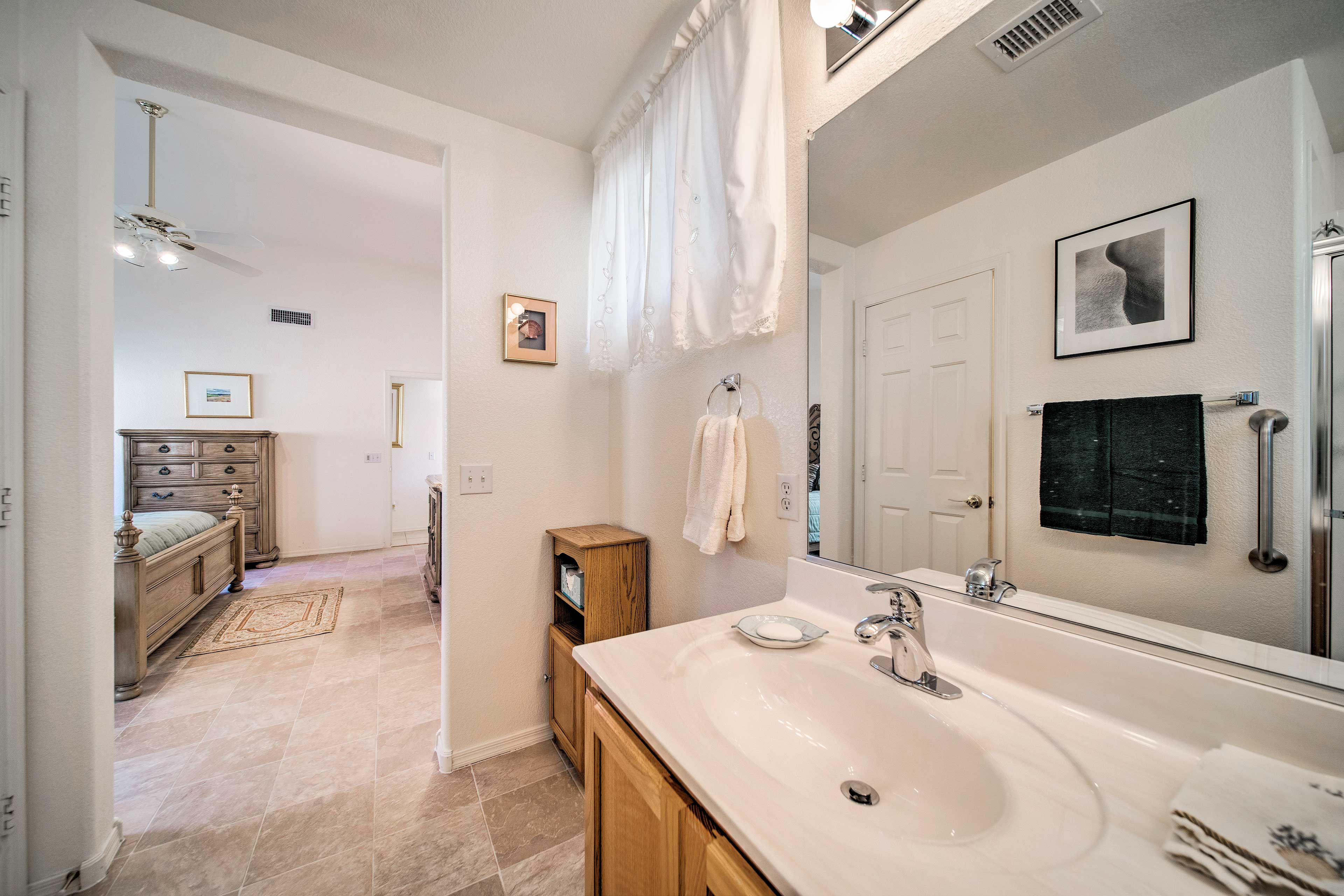 An en-suite bathroom is attached for your convenience.