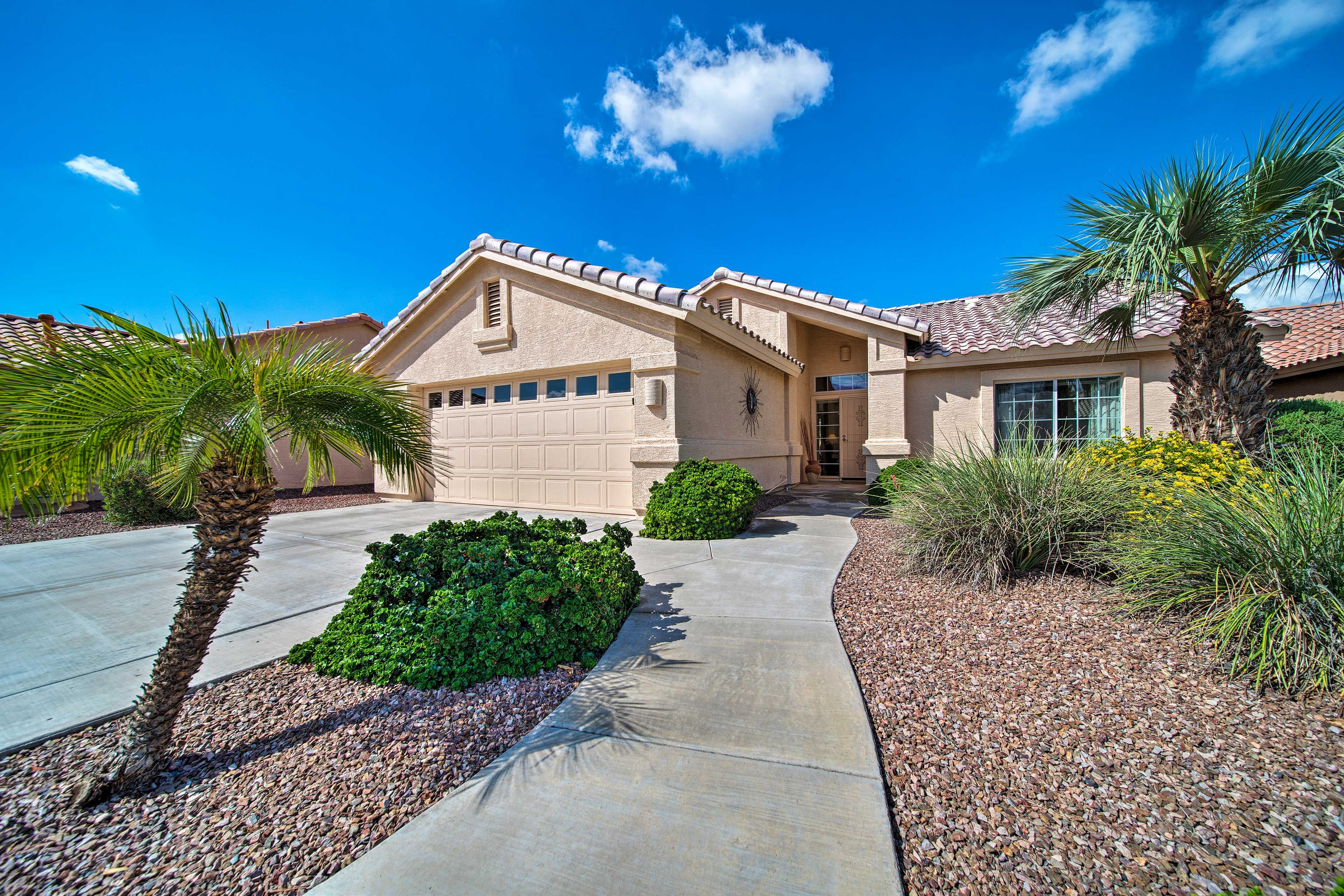 Lush tropics welcome you to this Goodyear vacation rental!