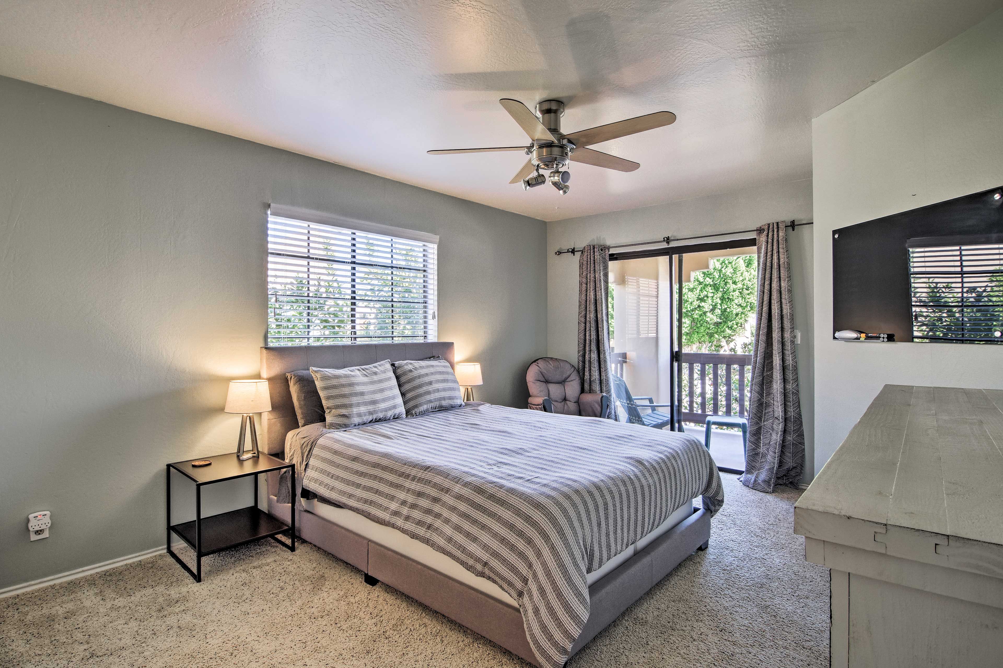 Drift to sleep in this queen bed.
