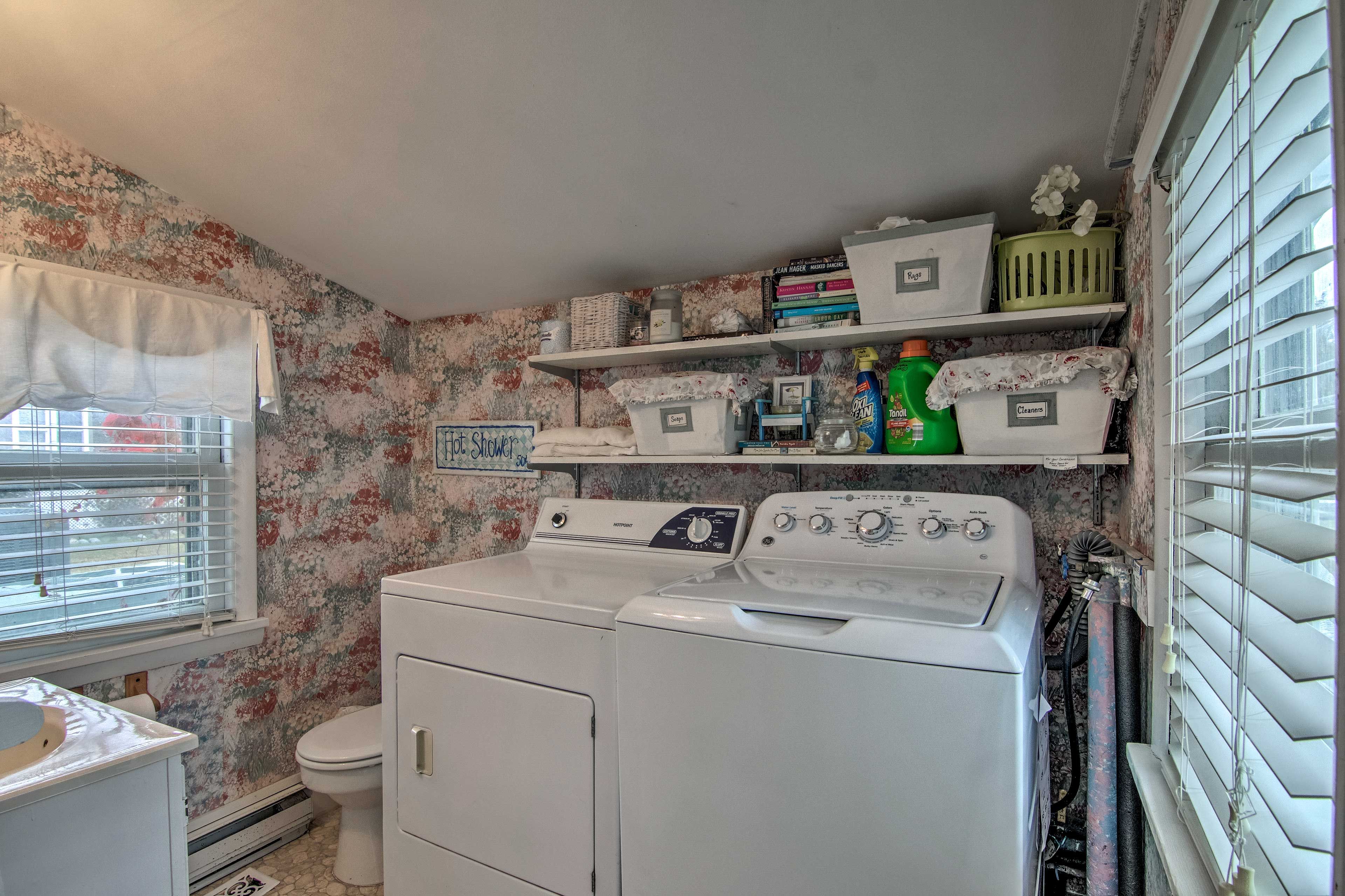 The washer and dryer are located in bathroom 2 as well.