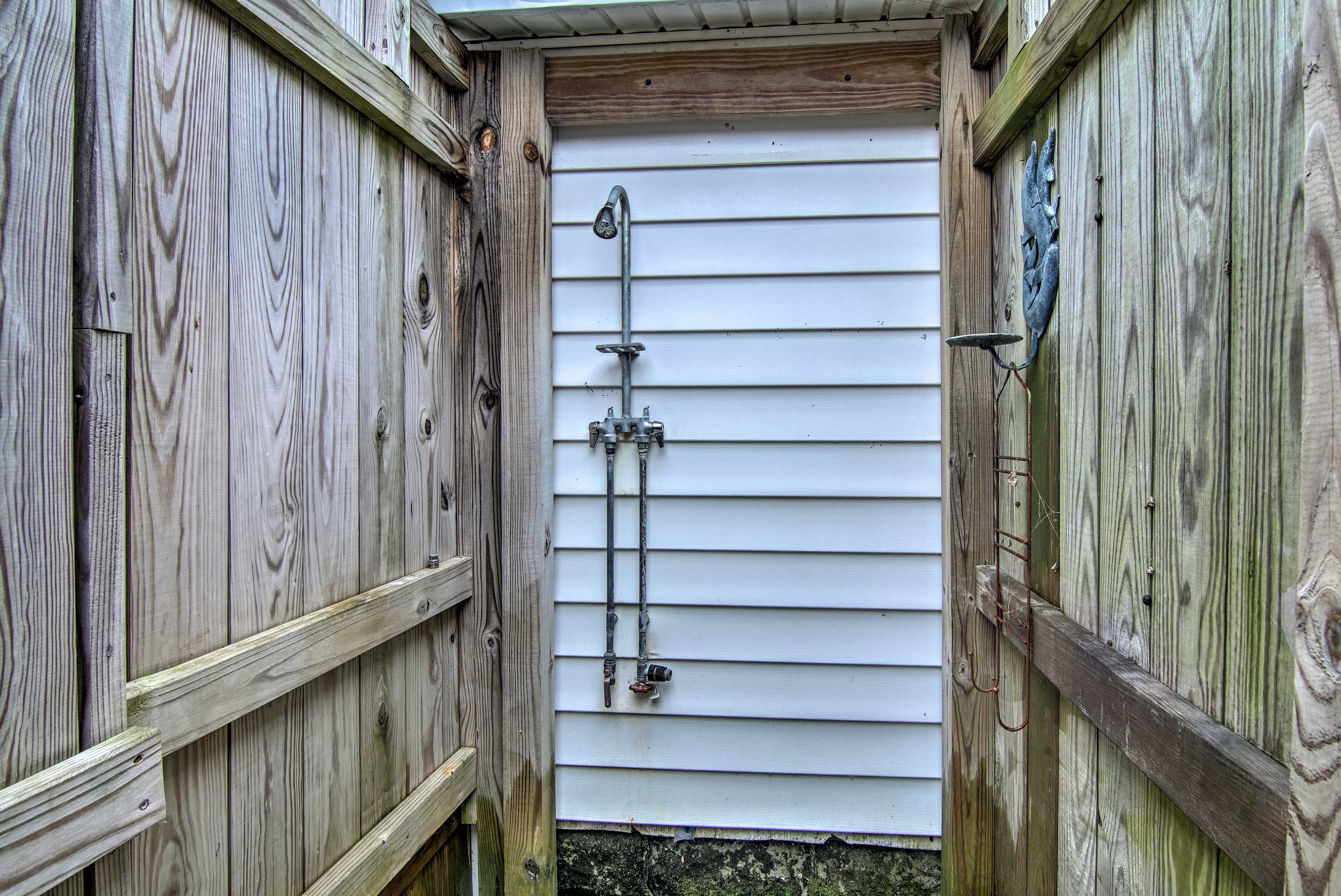 Wash off the sand from nearby Chincoteague Island Beach in the outside shower.