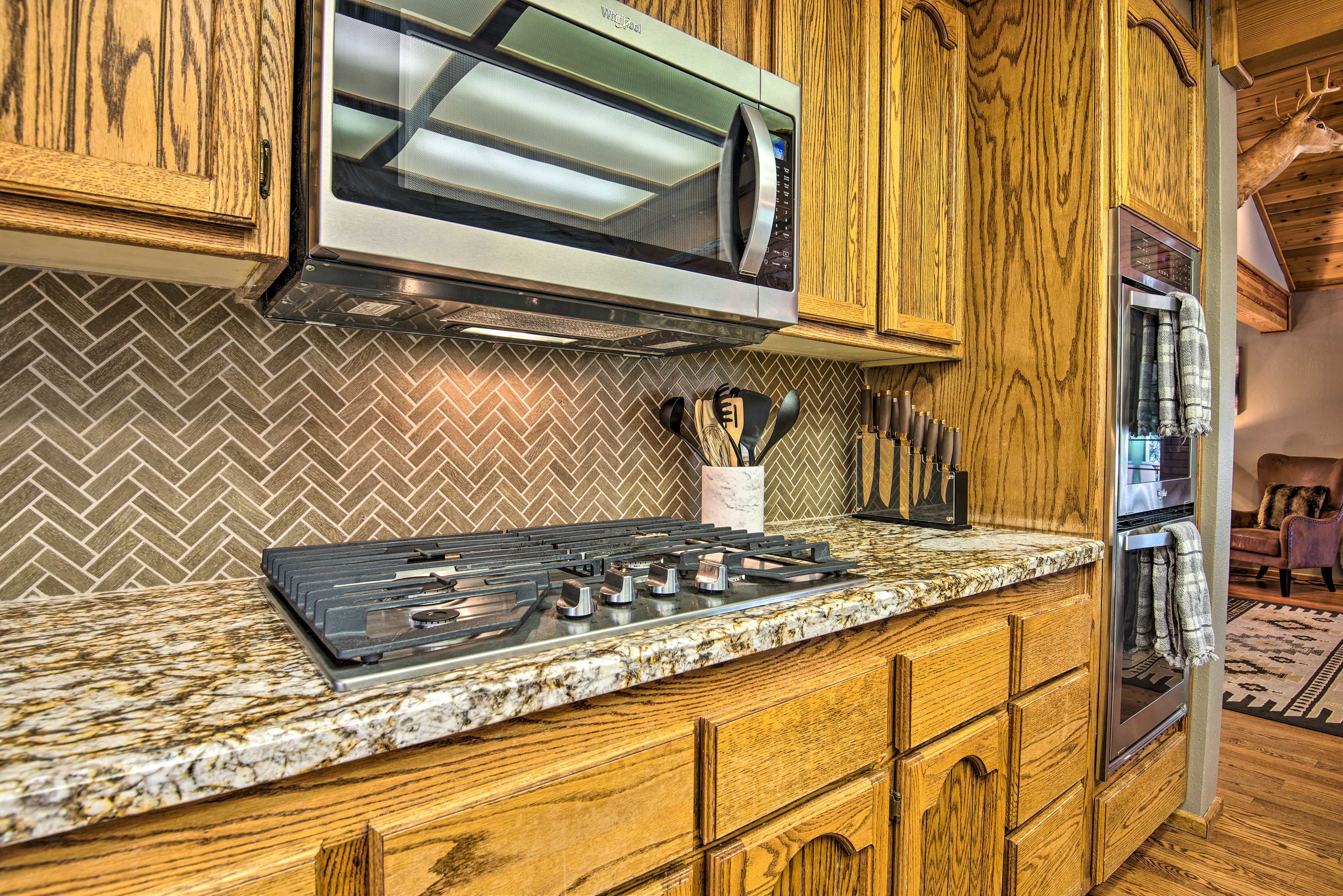Stainless steel appliances highlight the kitchen.