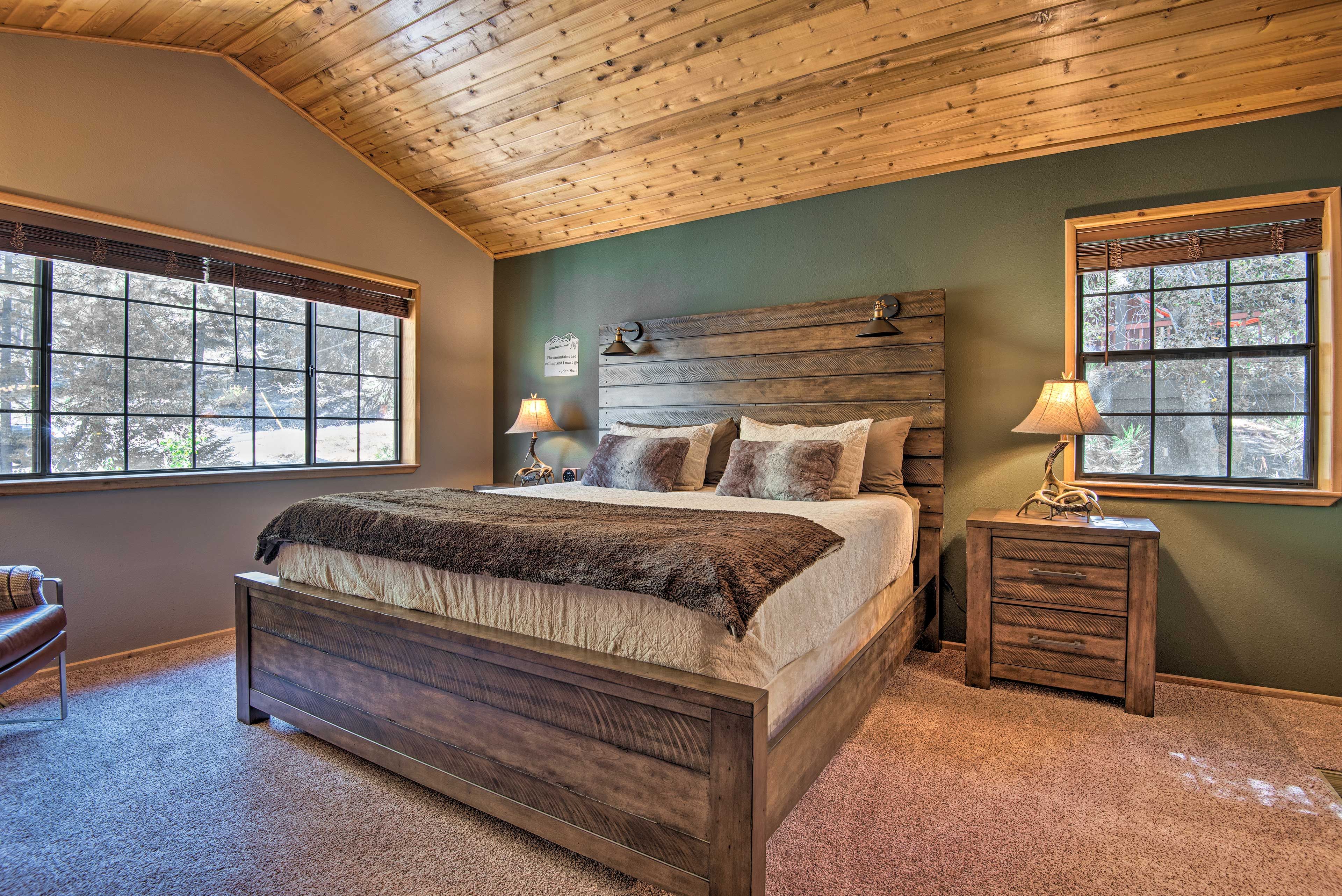 The first bedroom is complete with a king-sized bed.