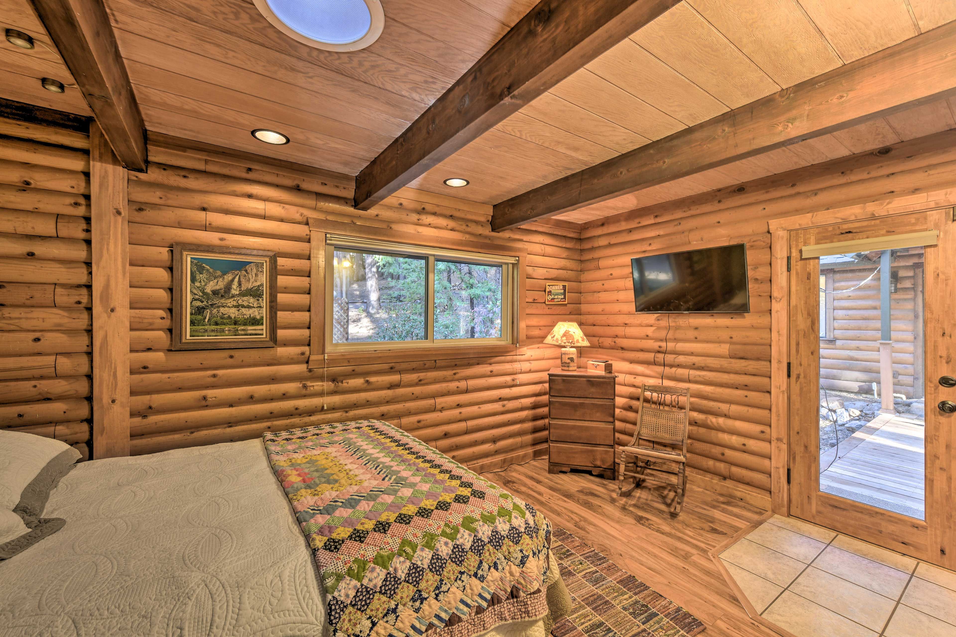 Bedroom 1 | Queen Bed | Patio Access | Main Floor