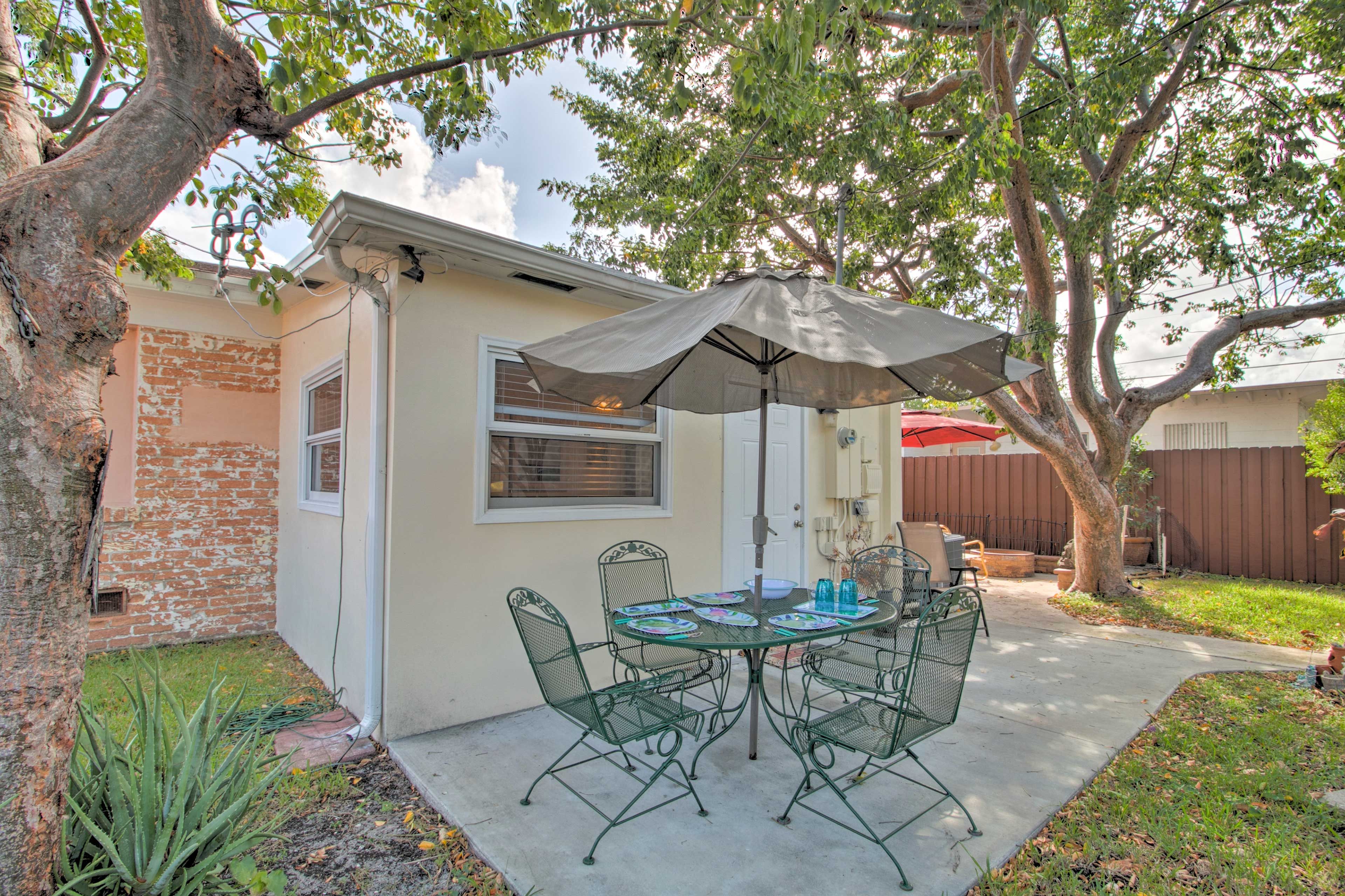 Gather for a meal on the outside dining table.