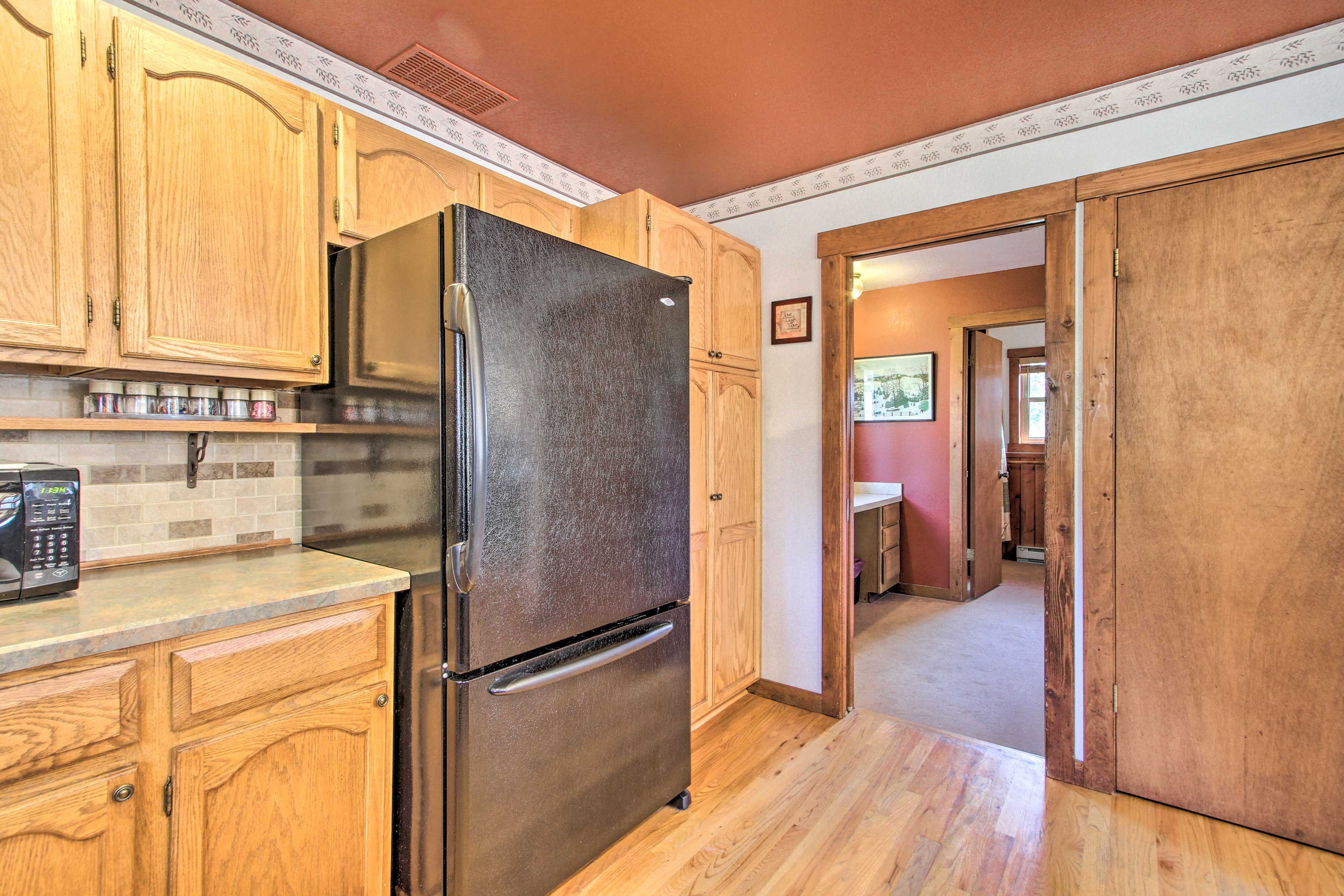 Stow away any leftovers in the spacious refrigerator.