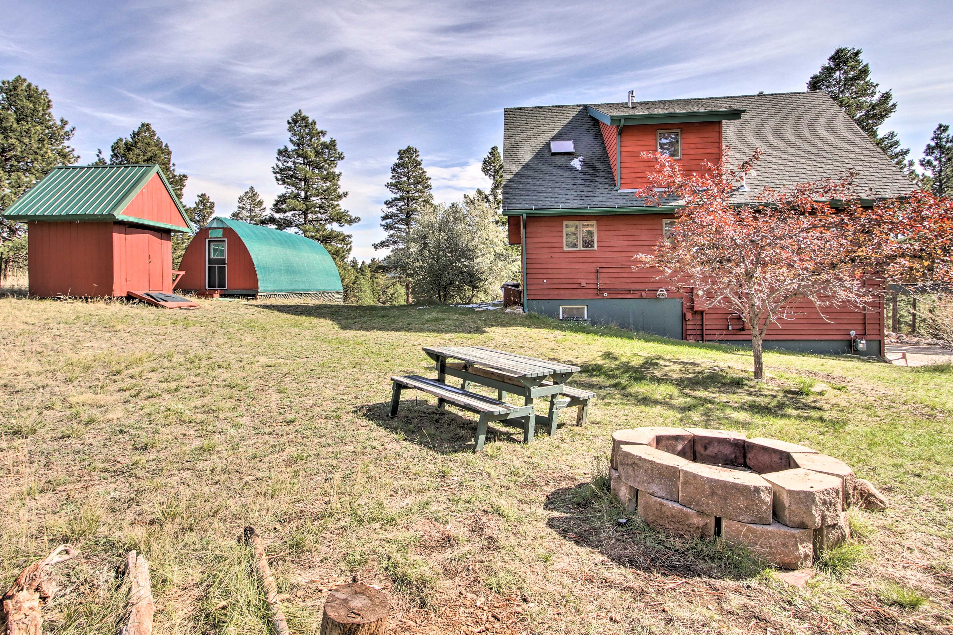 The mountaintop home boasts peaceful indoor and outdoor living space.