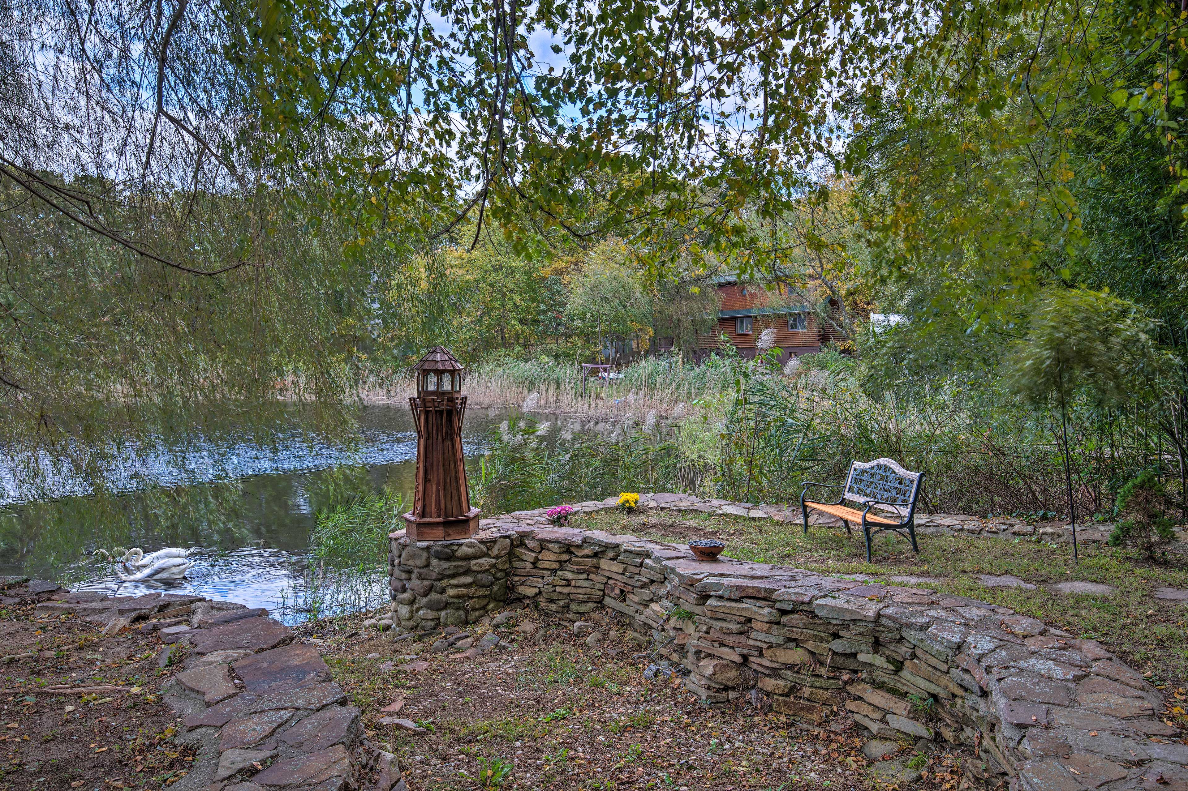 Peruse the pages of your latest read on the edge of the lake.