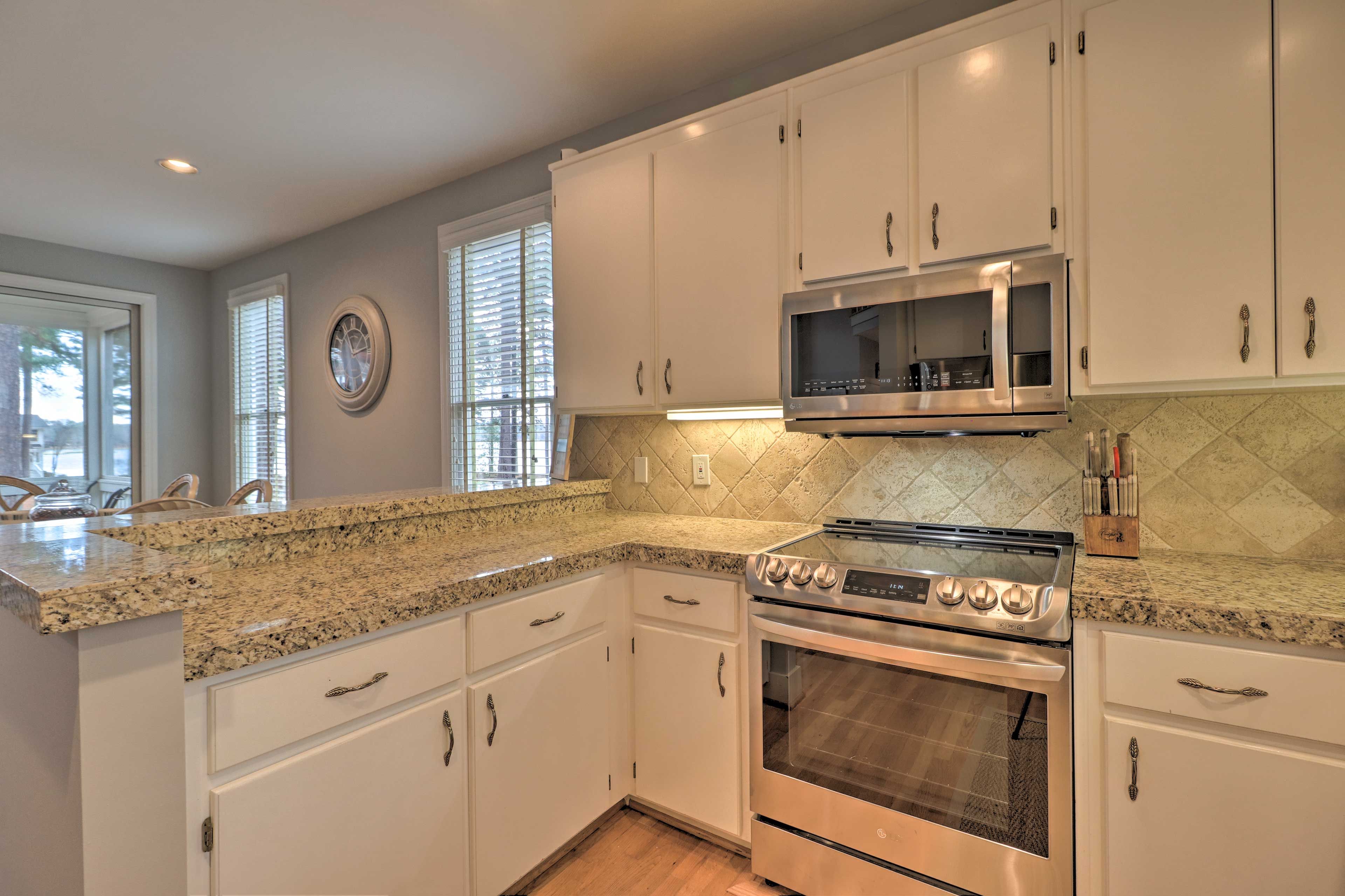 Pass meals over the breakfast bar with seating for 2.