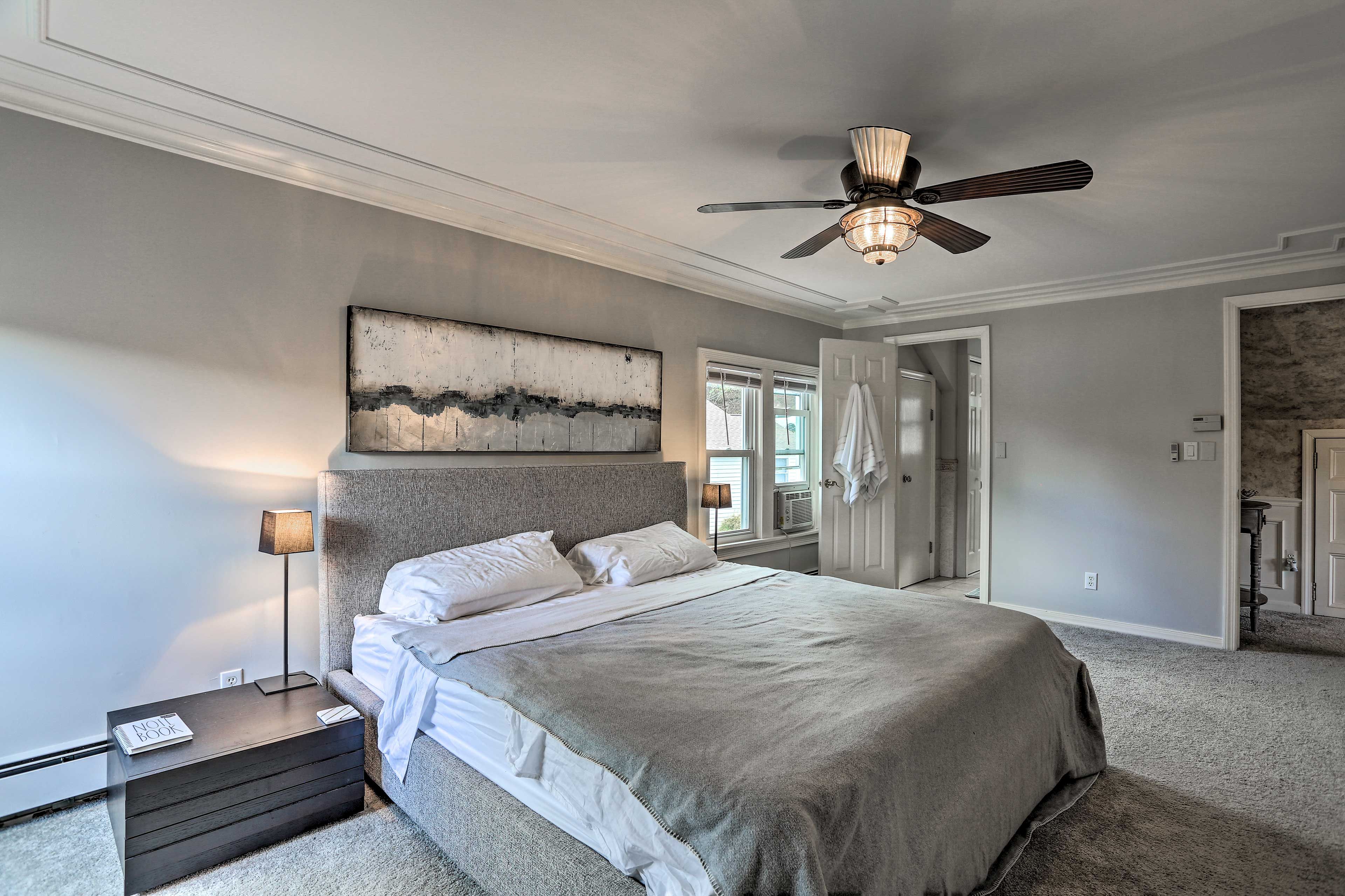 This bedroom features a private en-suite bathroom.