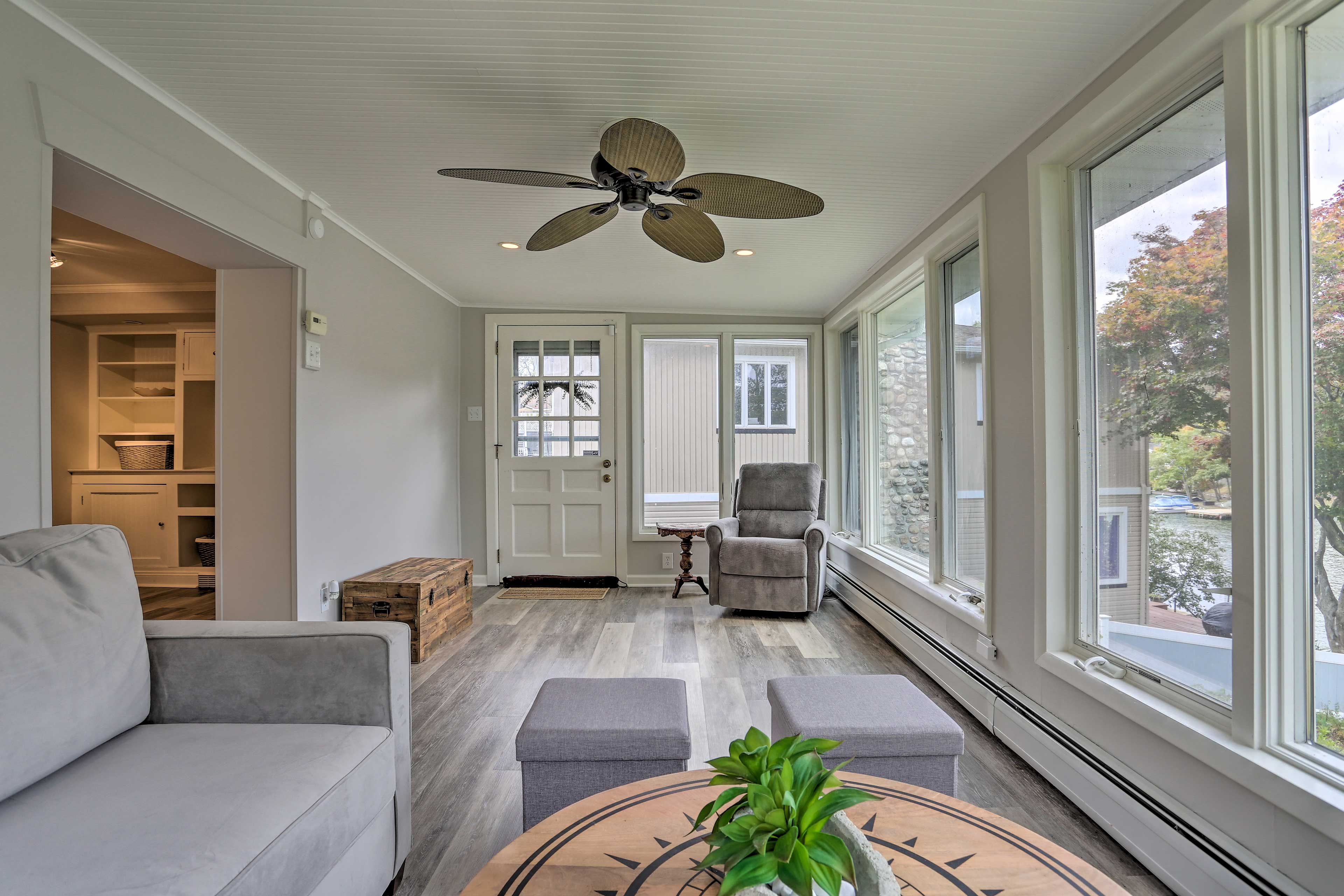 Relax in the sunroom with a good book in hand.