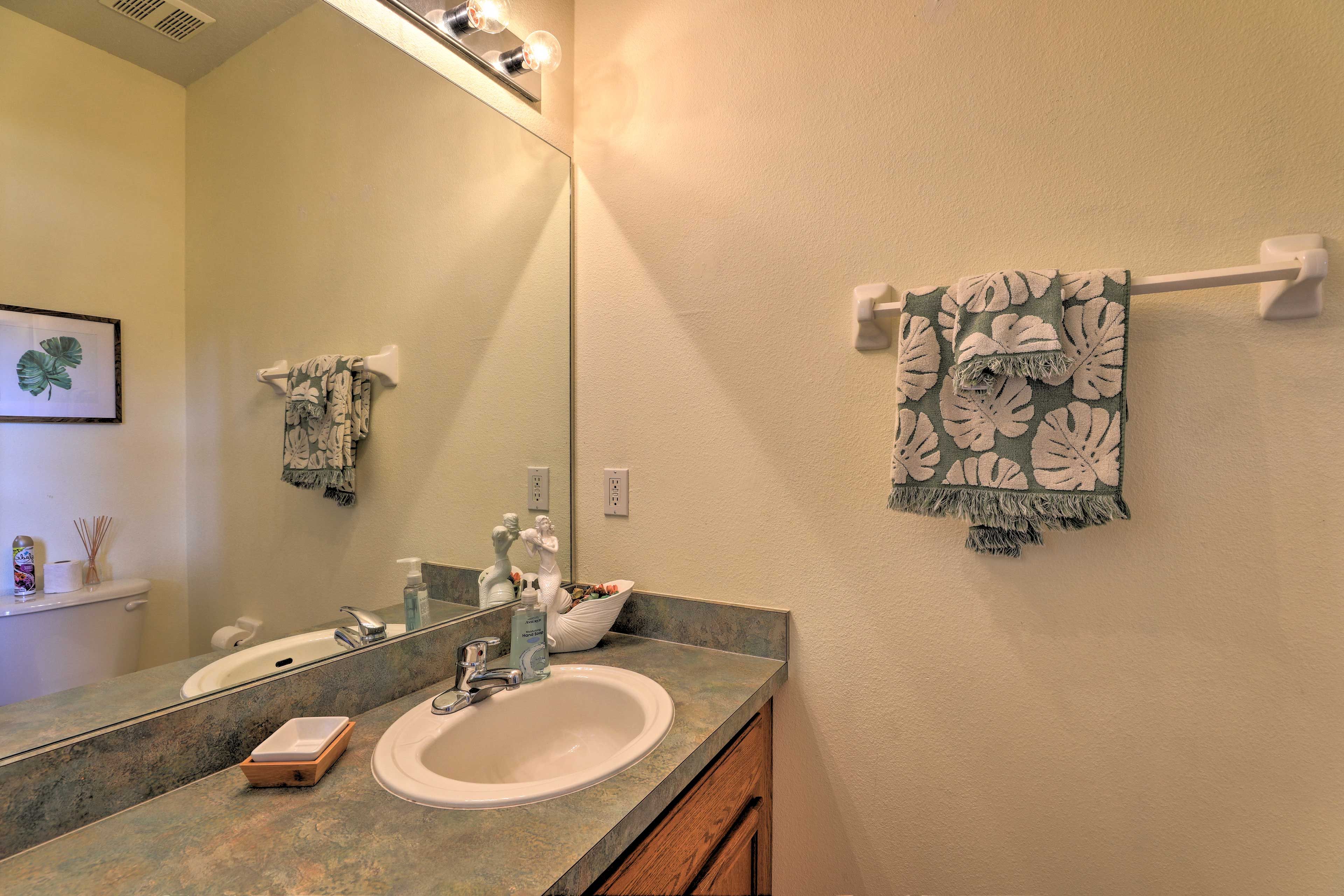 Freshen up in the half bathroom.