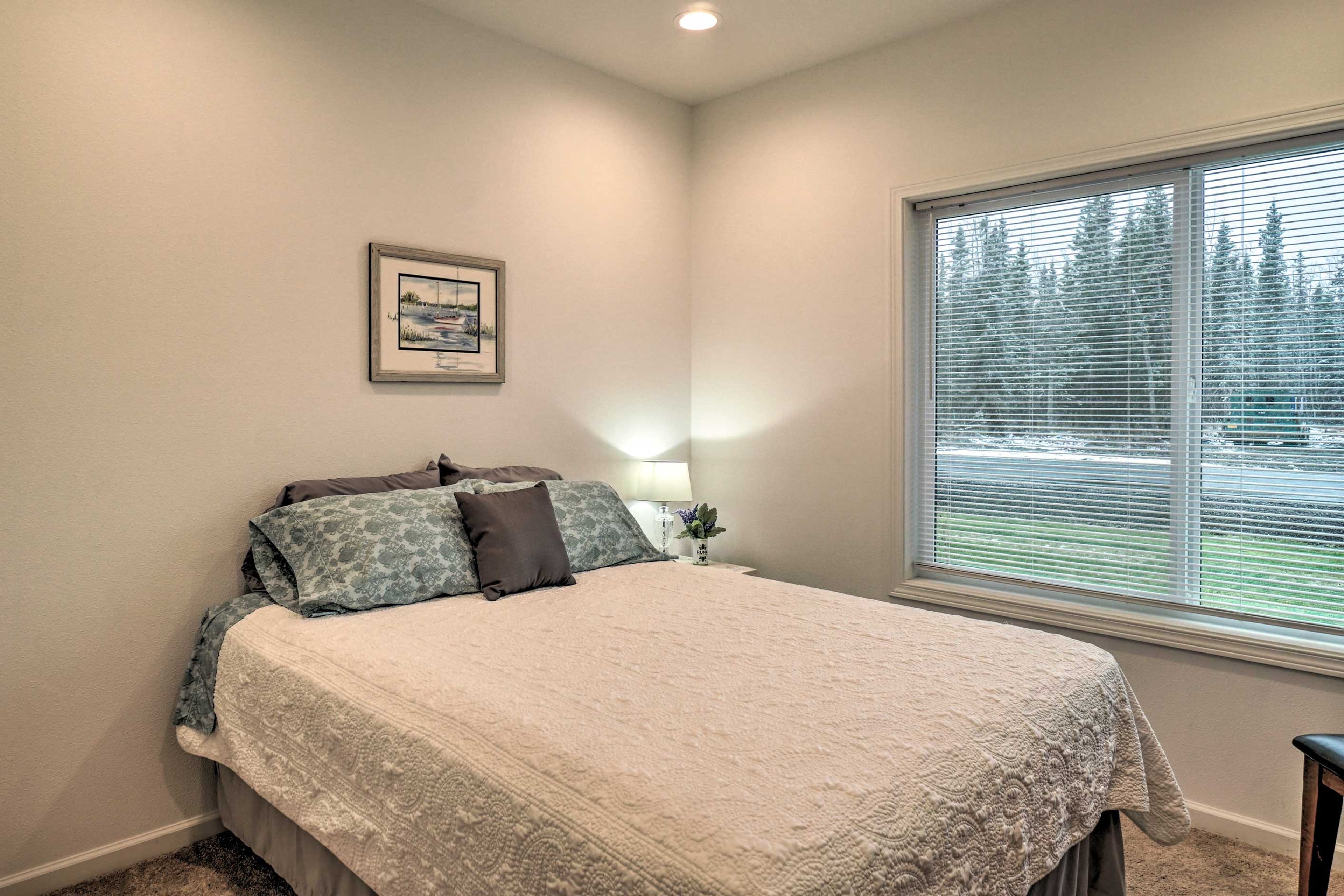 This bedroom includes a queen bed.