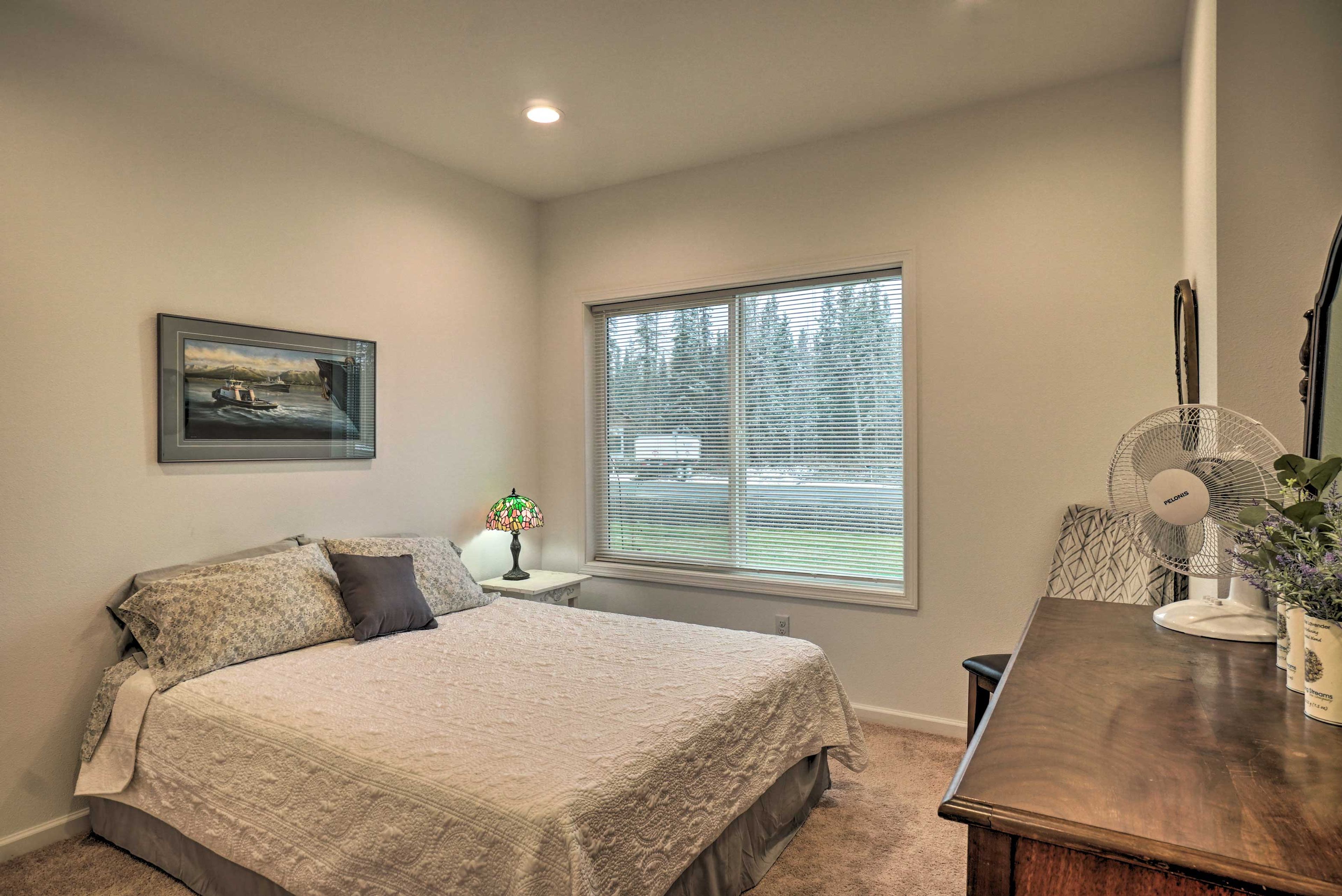 Two people will sleep soundly in this well-appointed room.