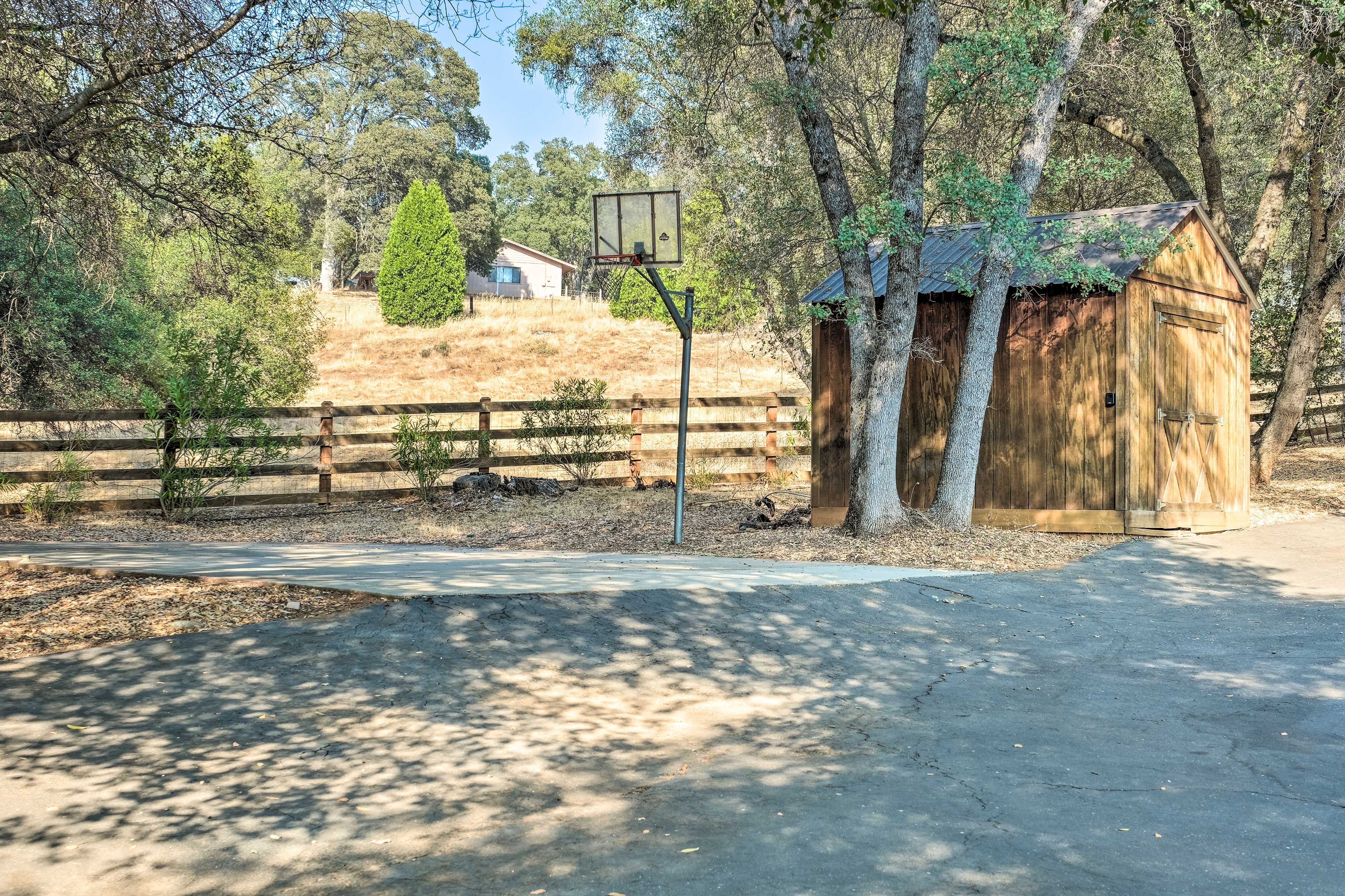 The property even boasts a basketball hoop for some extra entertainment!