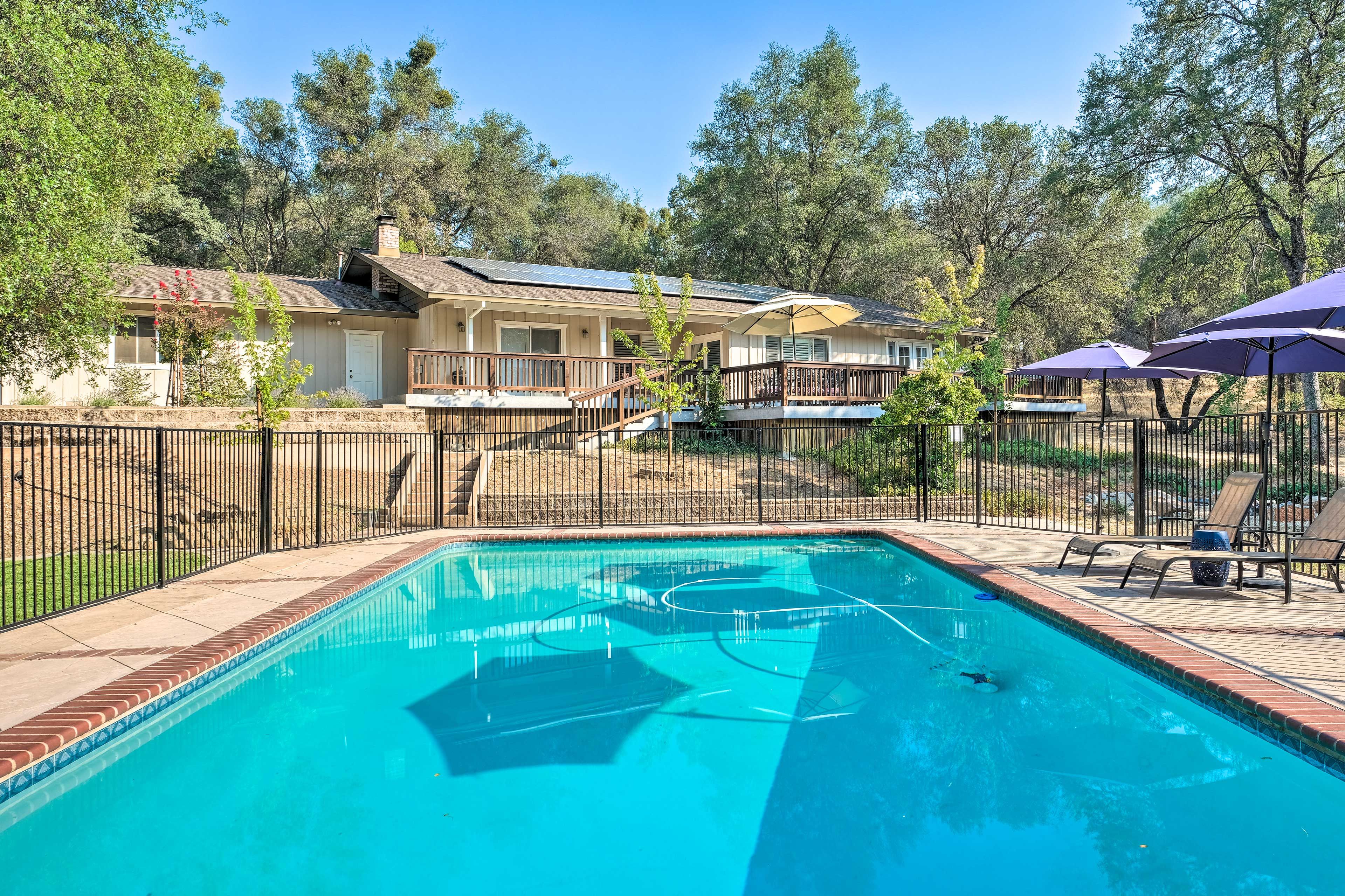 This expansive vacation rental boasts an outdoor pool!