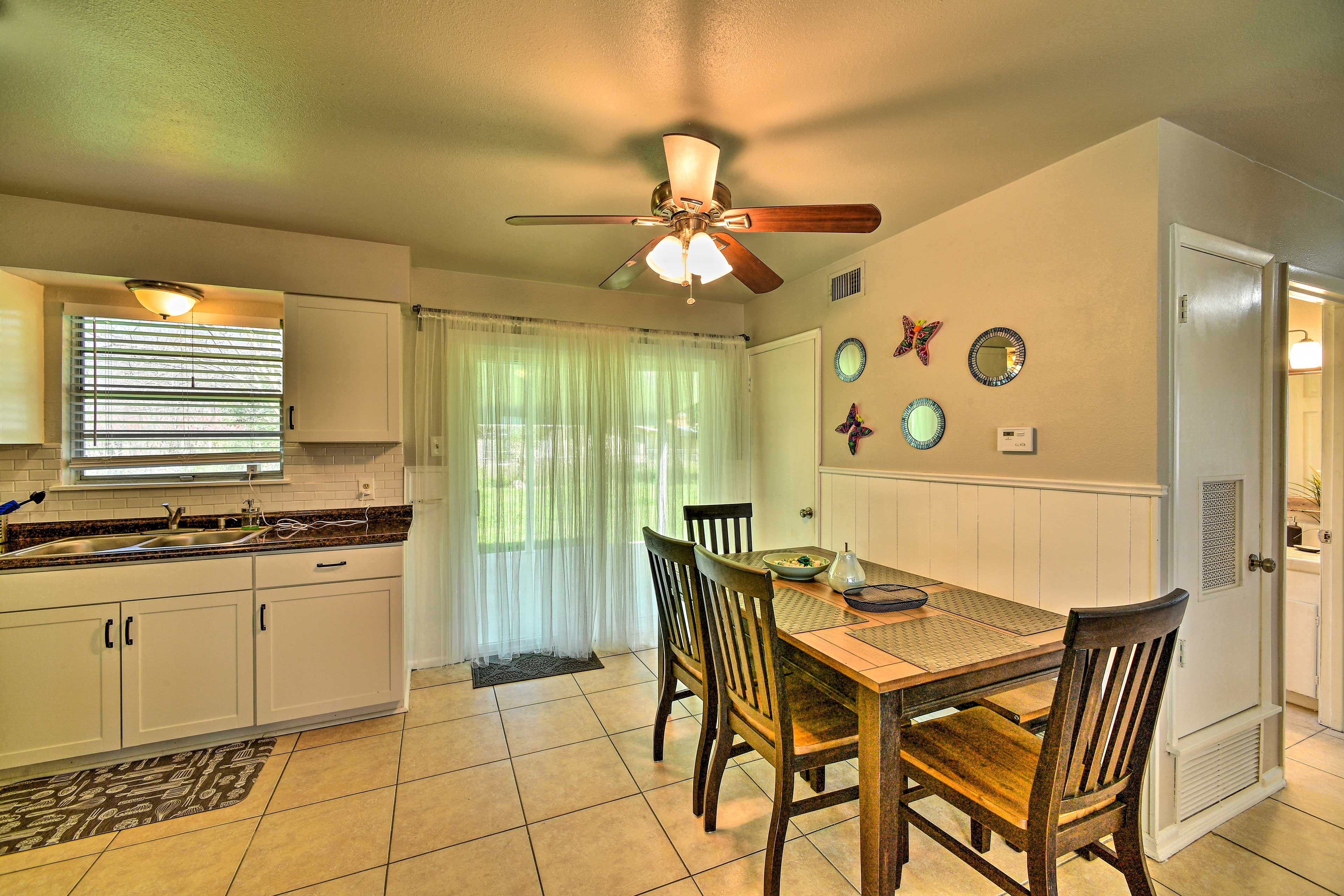 The living room leads into the kitchen and dining area.