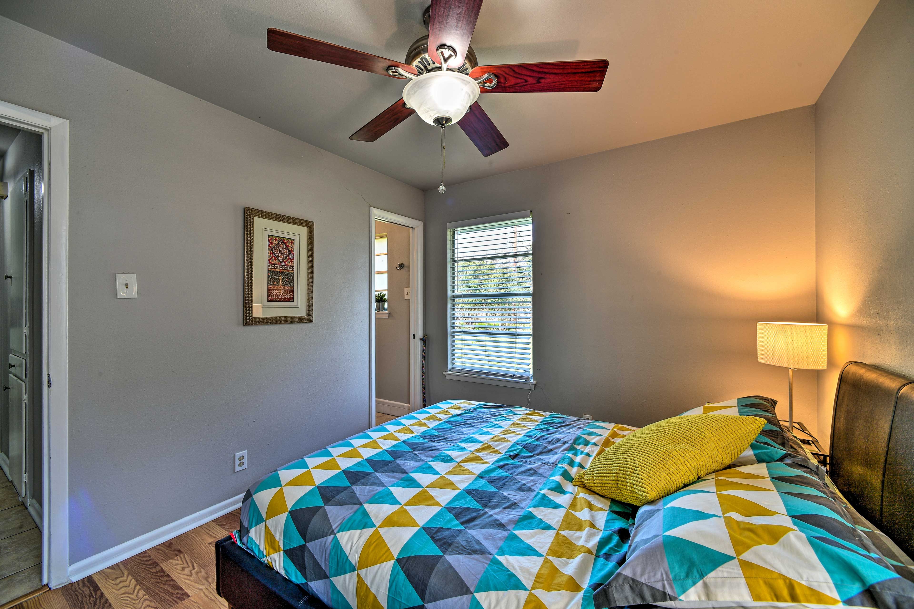 The room features a queen bed and an en-suite bathroom.