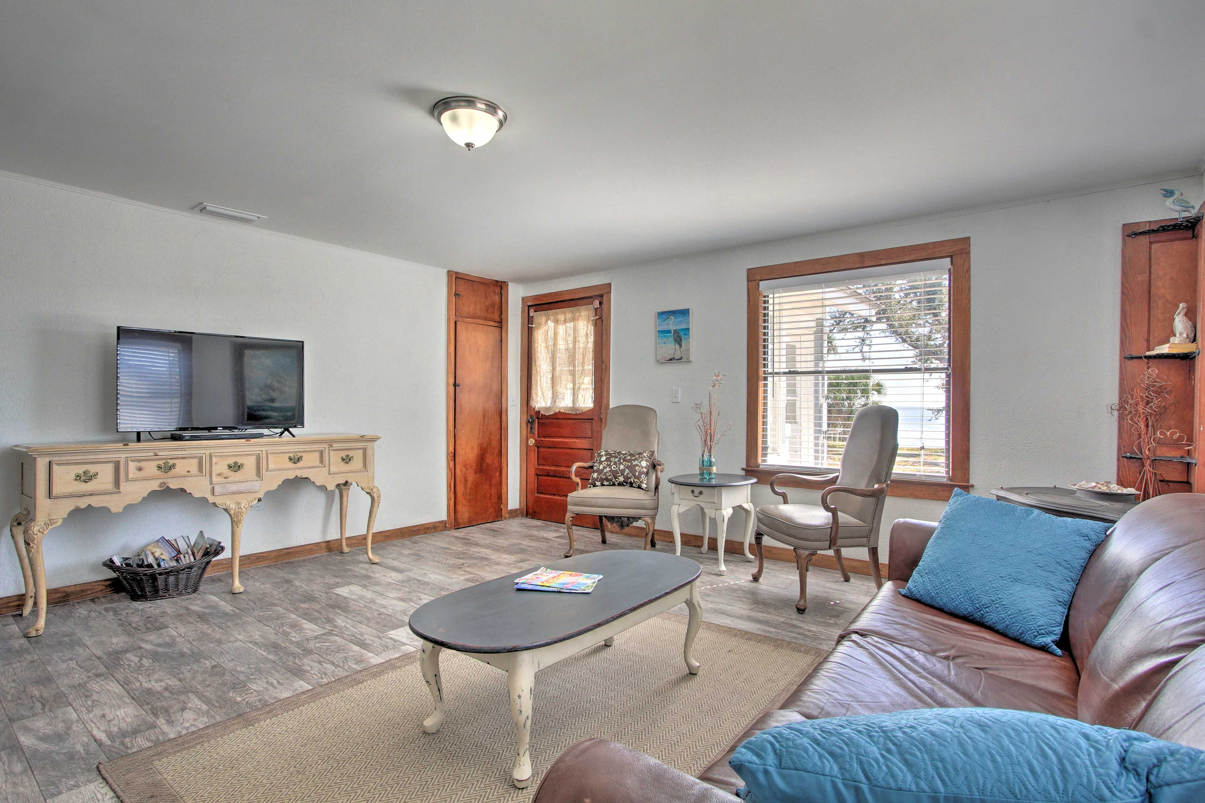 The living room is flooded with daylight during the day.
