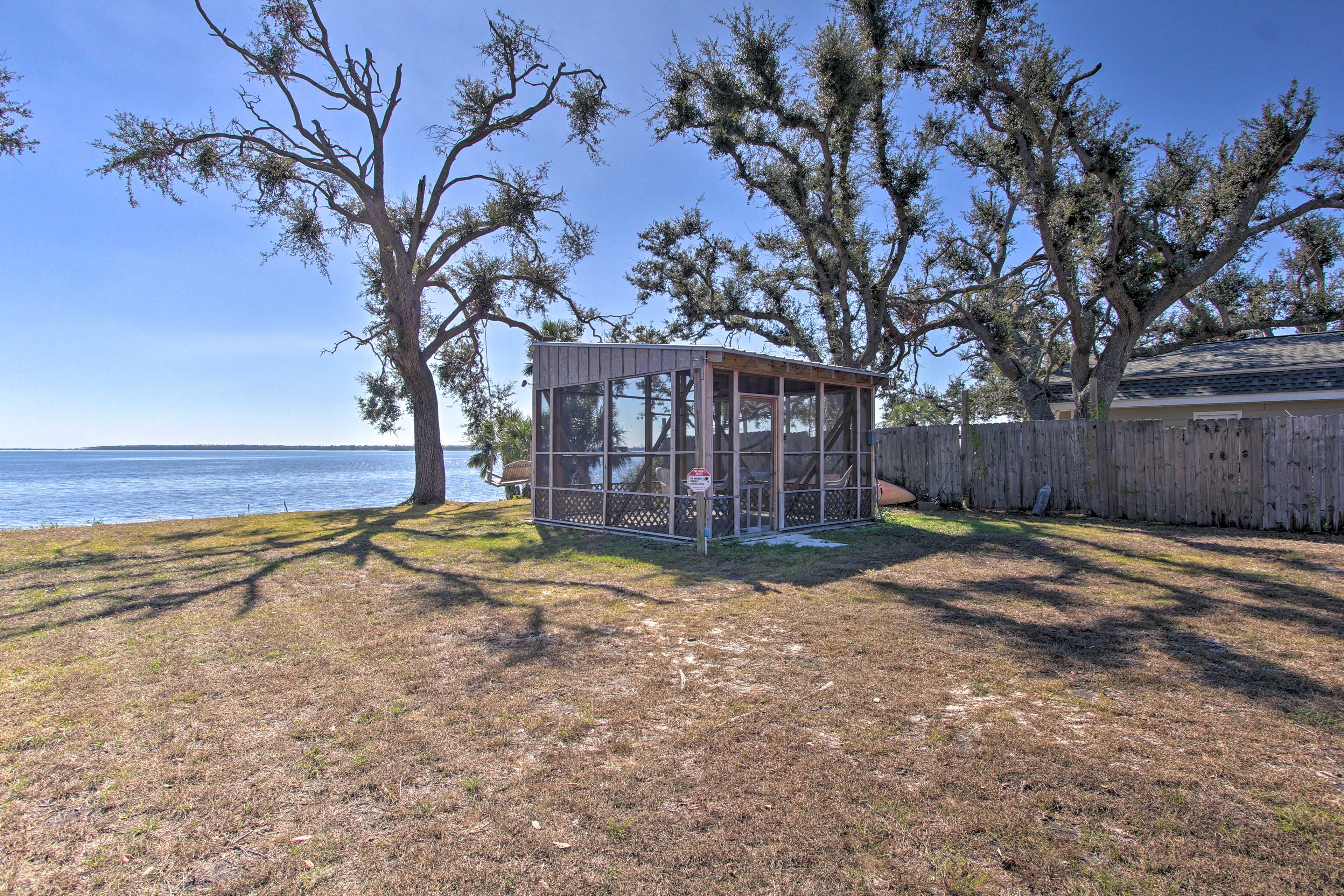Stroll on over to the shared screened-in porch.