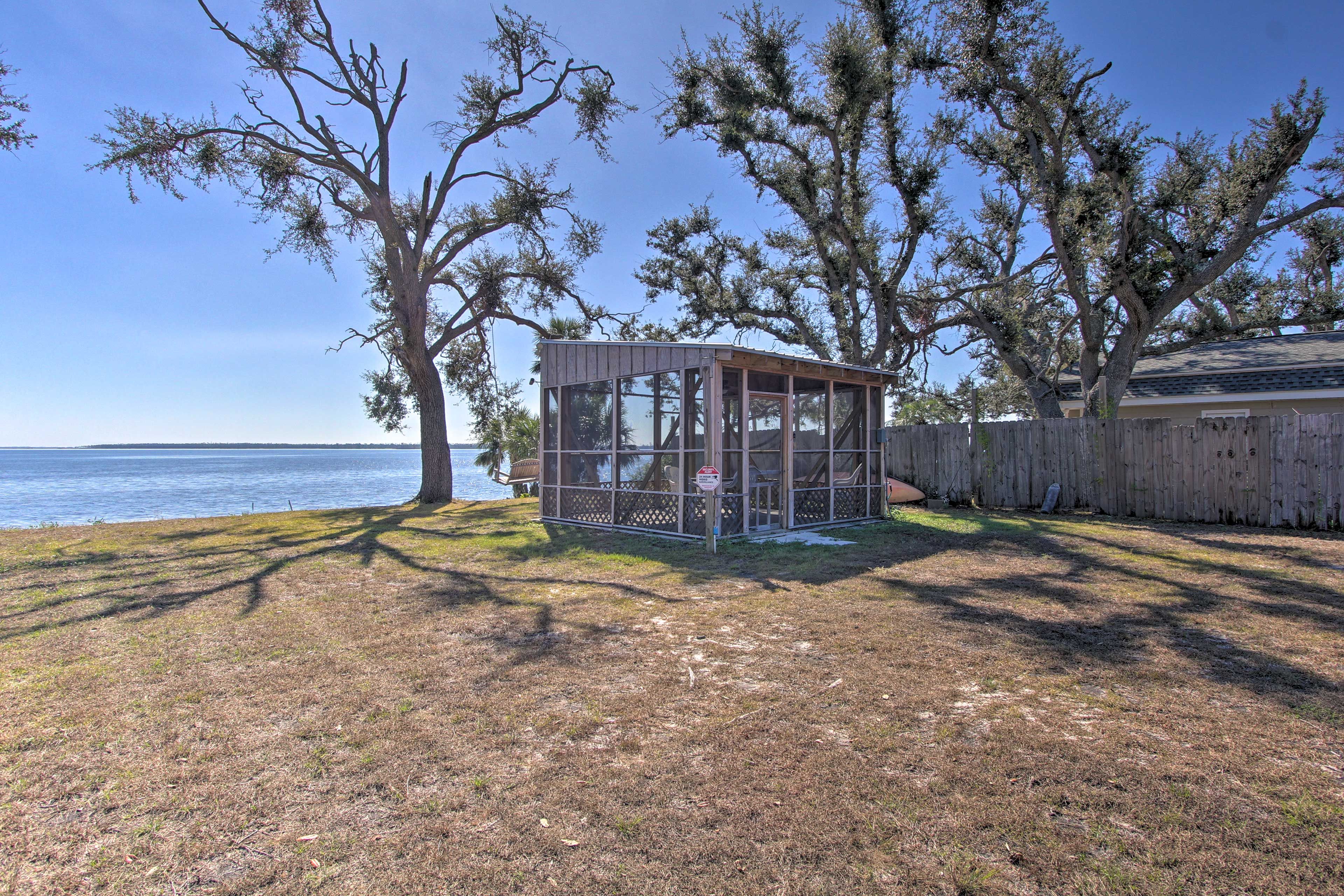 Stroll on over to the shared screened-in porch.