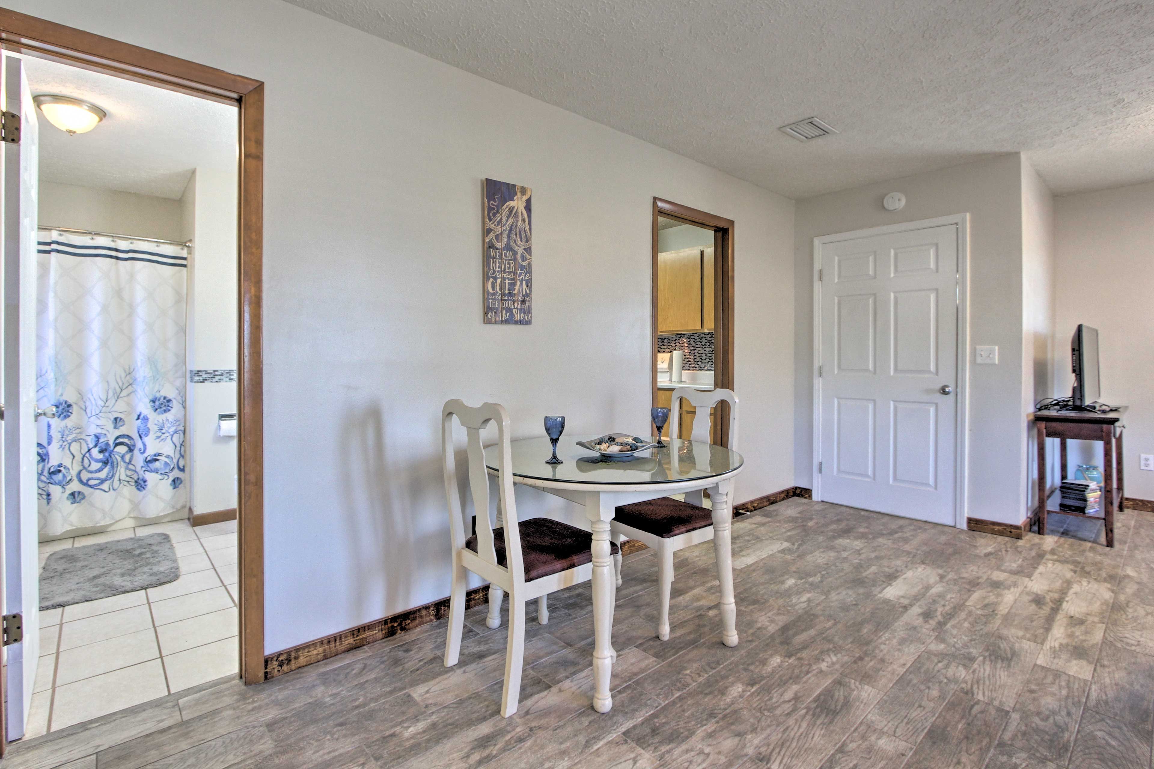 Gather around the dining table for a meal.