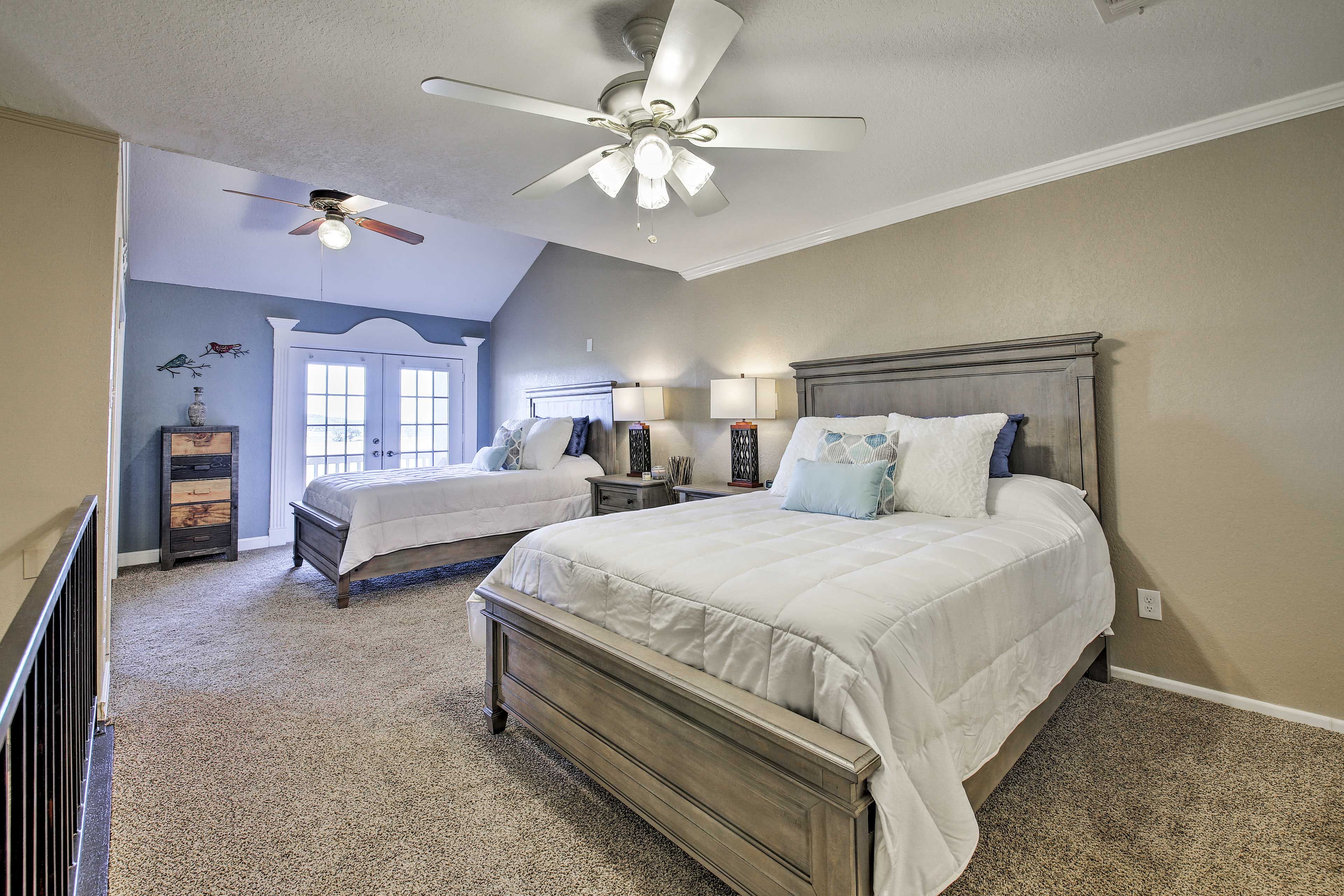 Upstairs, you'll find the bedroom with 2 queen beds.