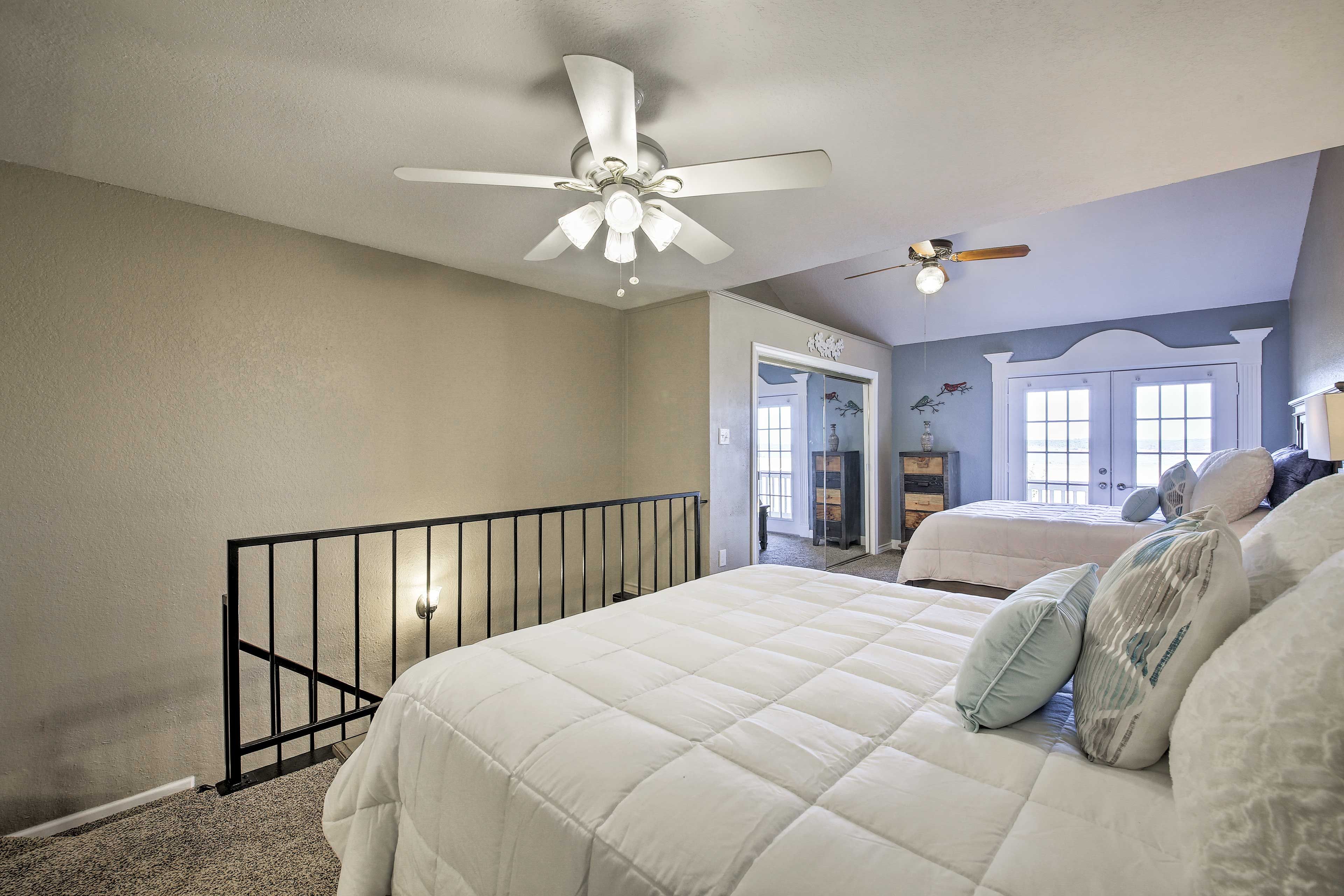 The bedroom features 2 ceiling fans to keep you cool during the summer.