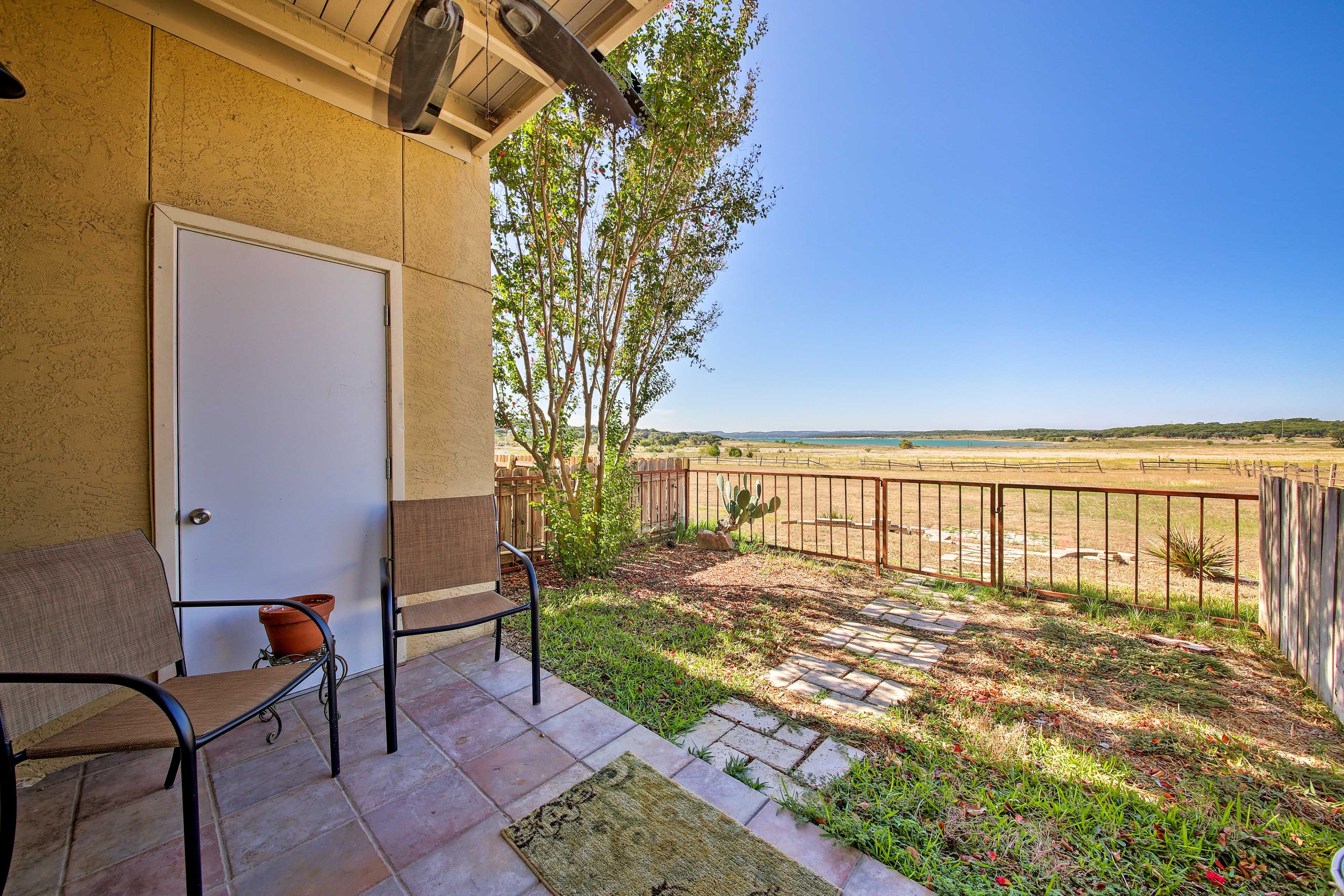 Easily take your furry friends outside to the fenced-in yard.